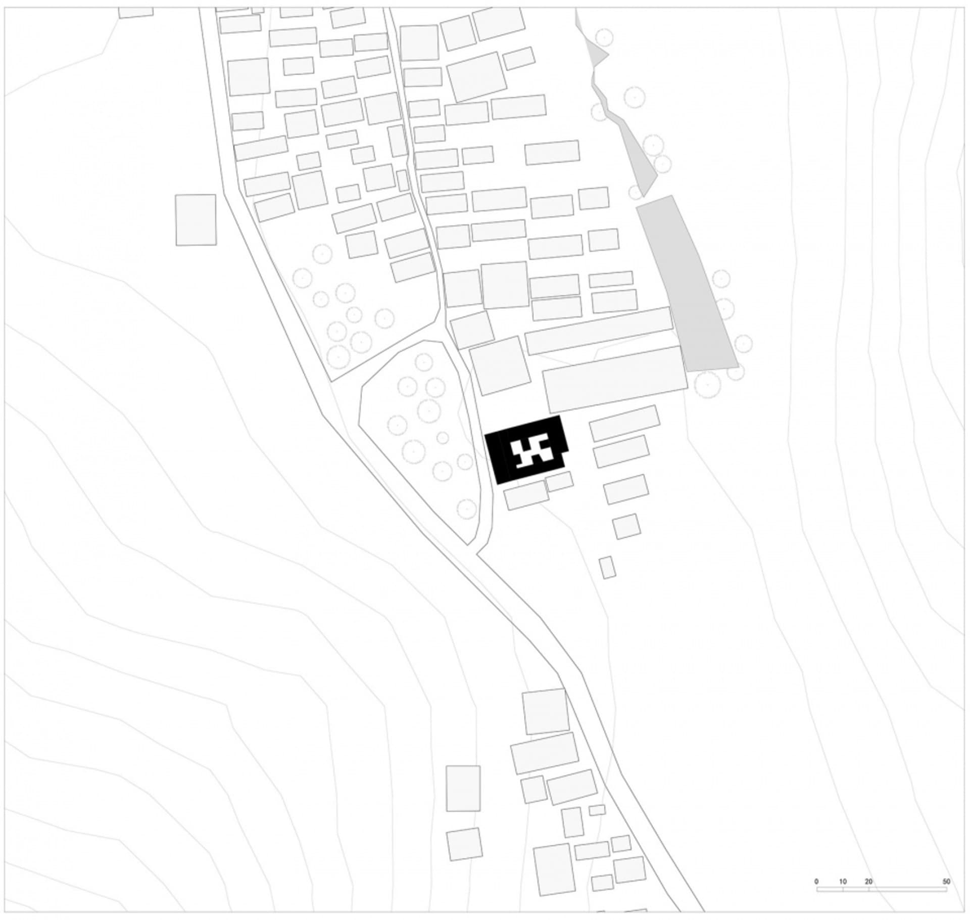 A black and white plan of an urban area with various labeled properties and geographical features.