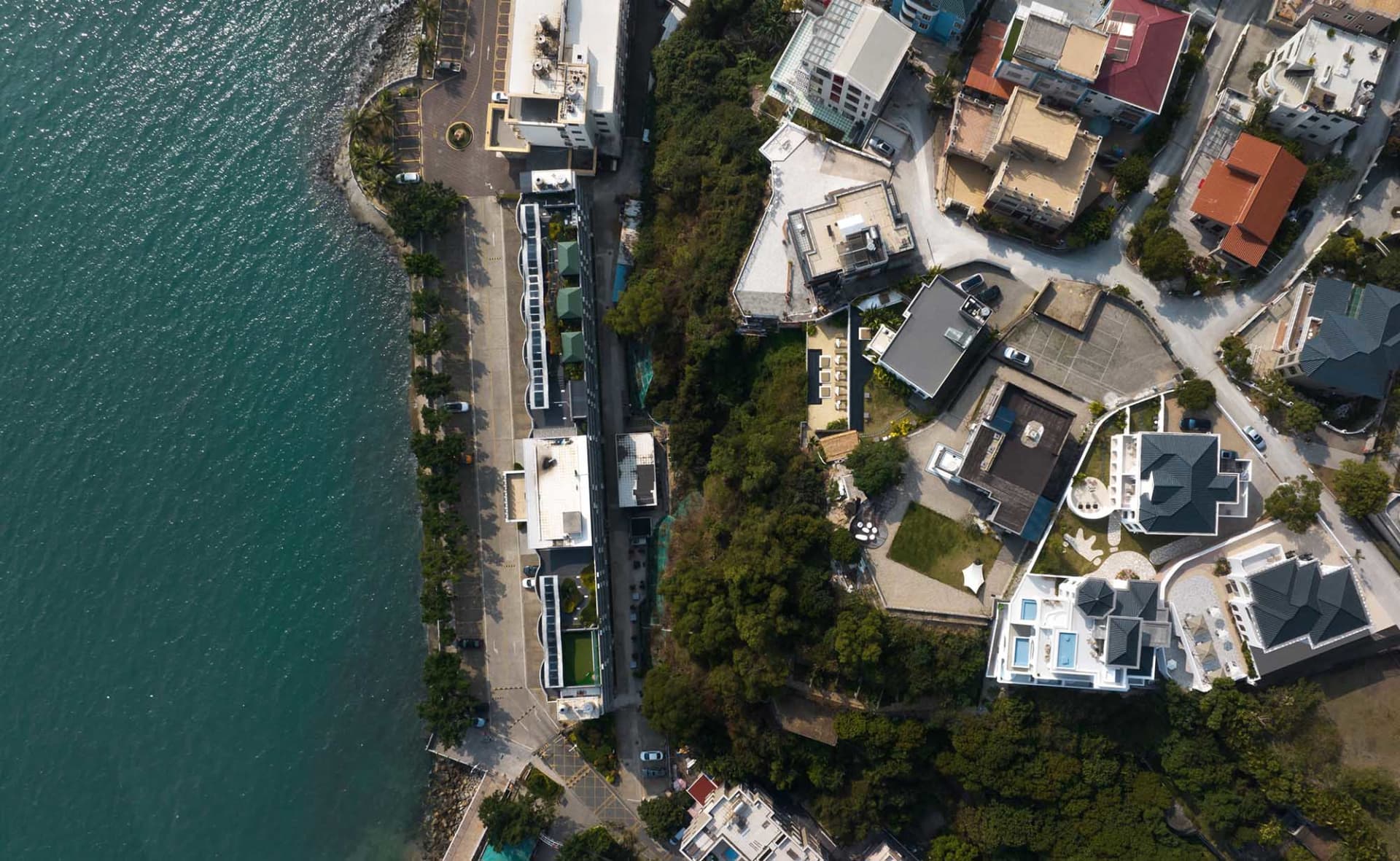 Aerial view of modern residential buildings with concrete exteriors.
