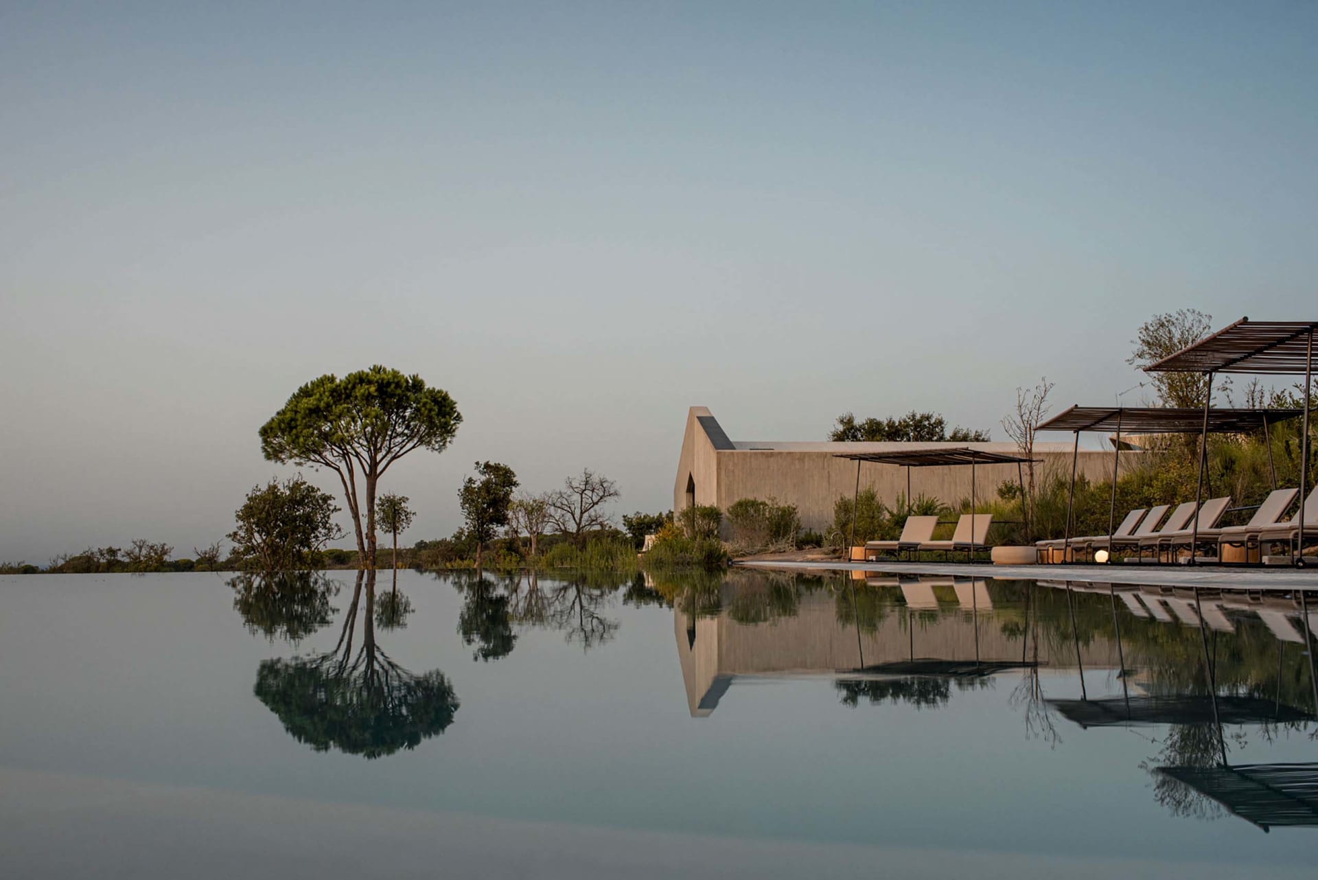Modern architecture featuring concrete ground, perfect for vacation rentals.