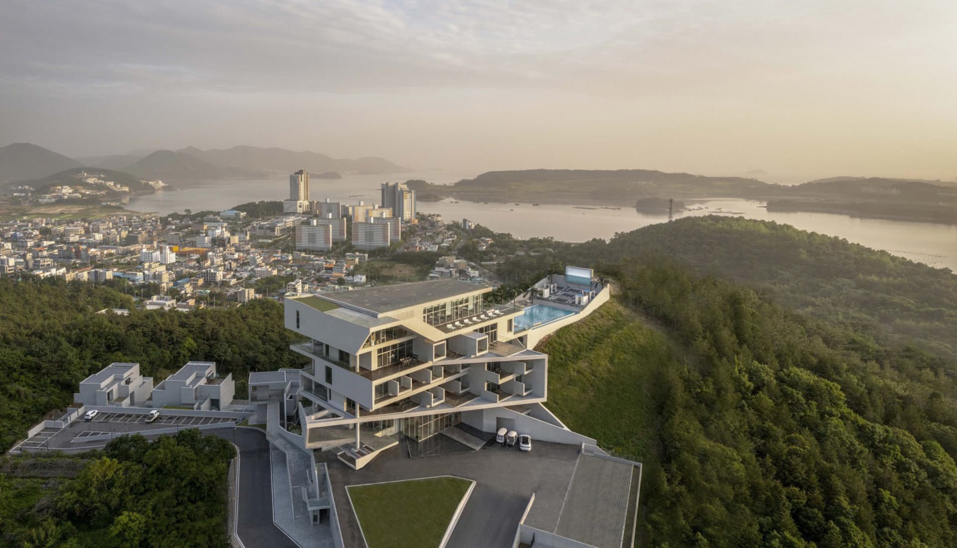 A modern residential building with concrete exterior features.