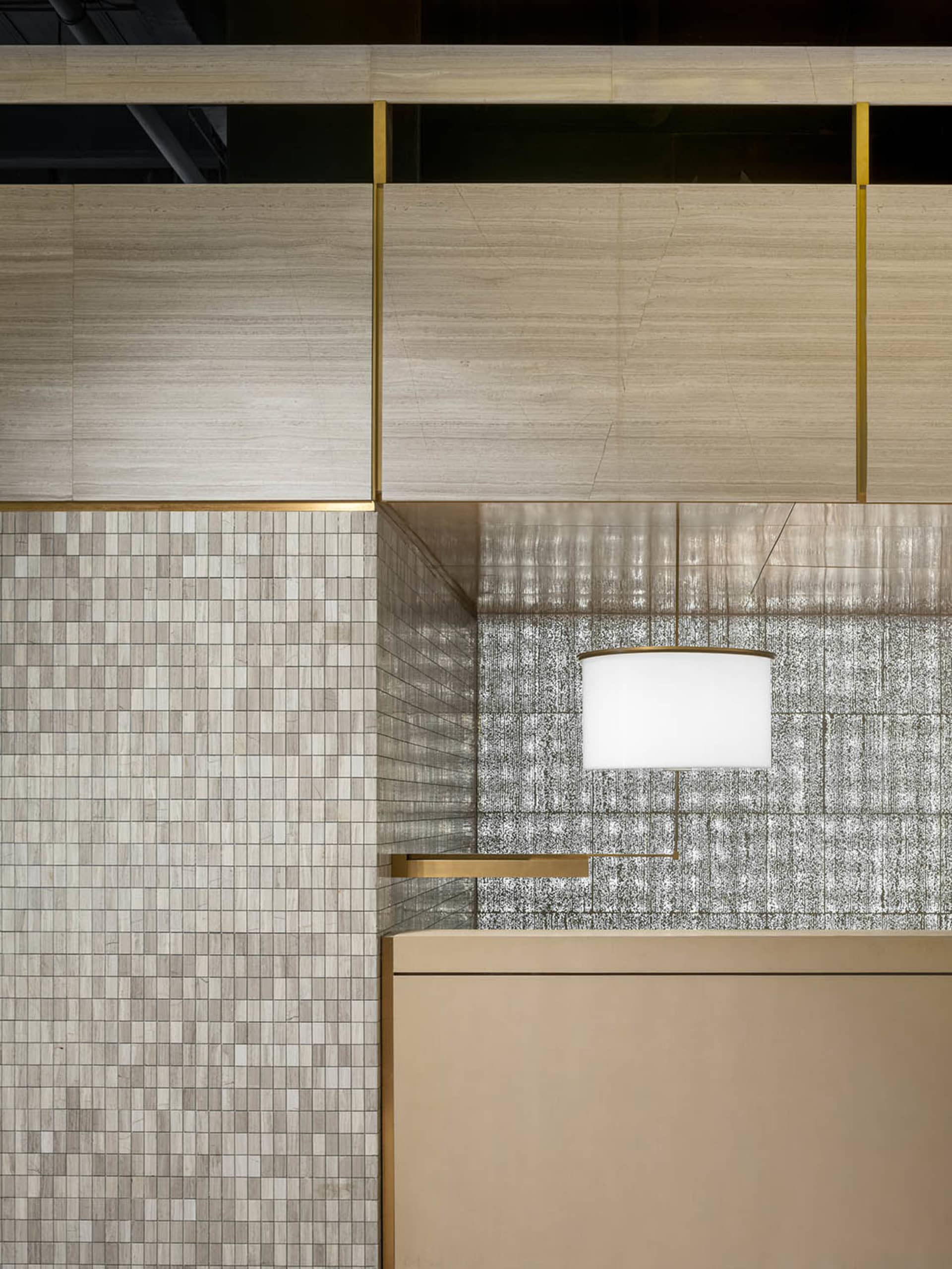 Modern retail interior featuring a mix of tile materials with a minimalist design.