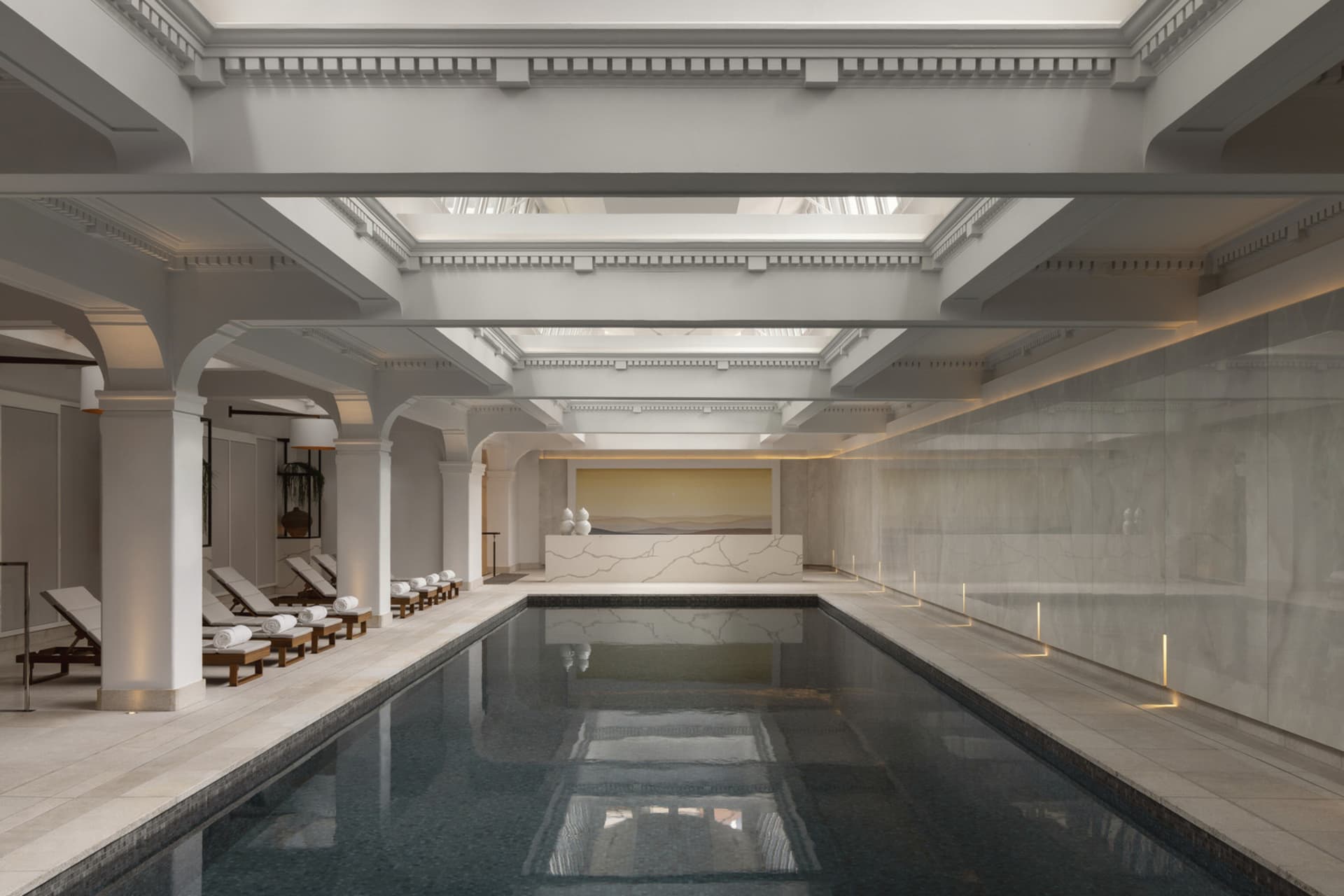 Modern spa interior with marble, glass, and concrete elements