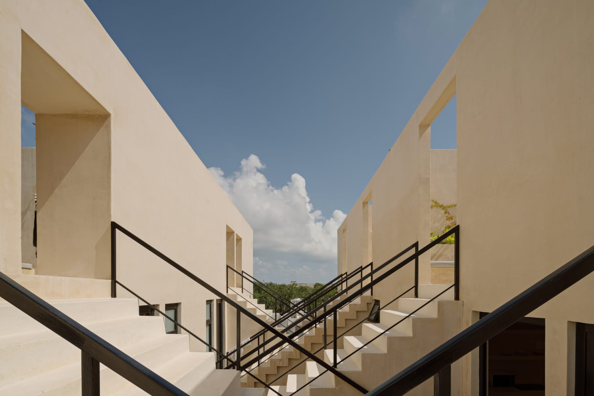 A modern architectural space featuring modular concrete structures.