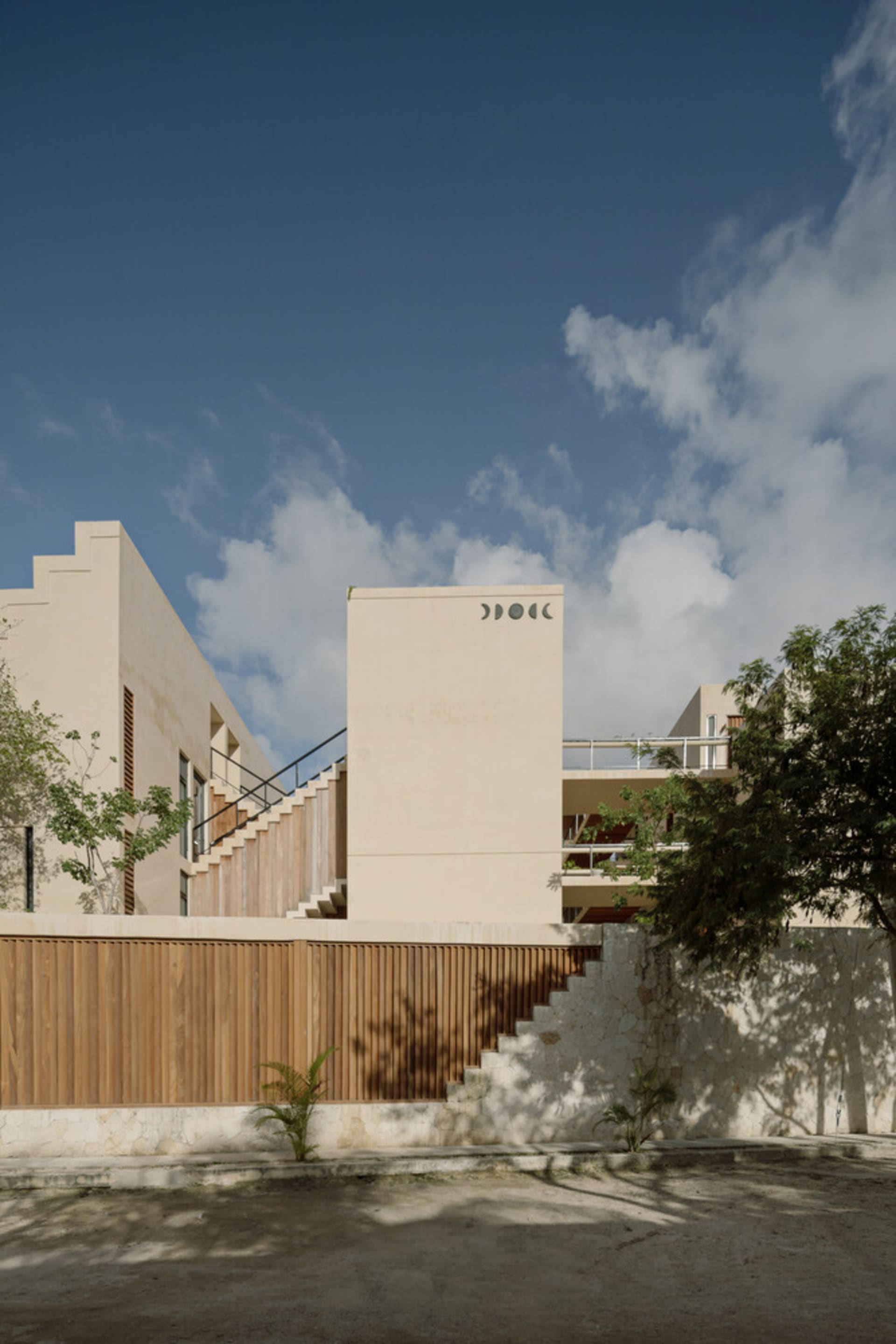A modern building with a minimalist design, constructed from concrete.