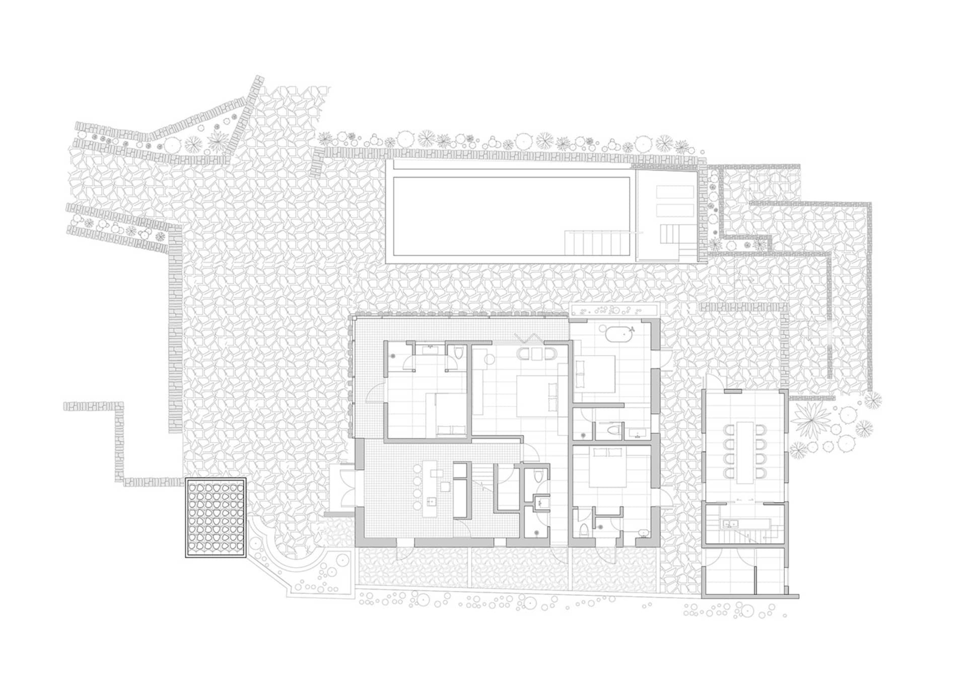 現代住宅平面圖，展現混凝土外觀與室內設計。