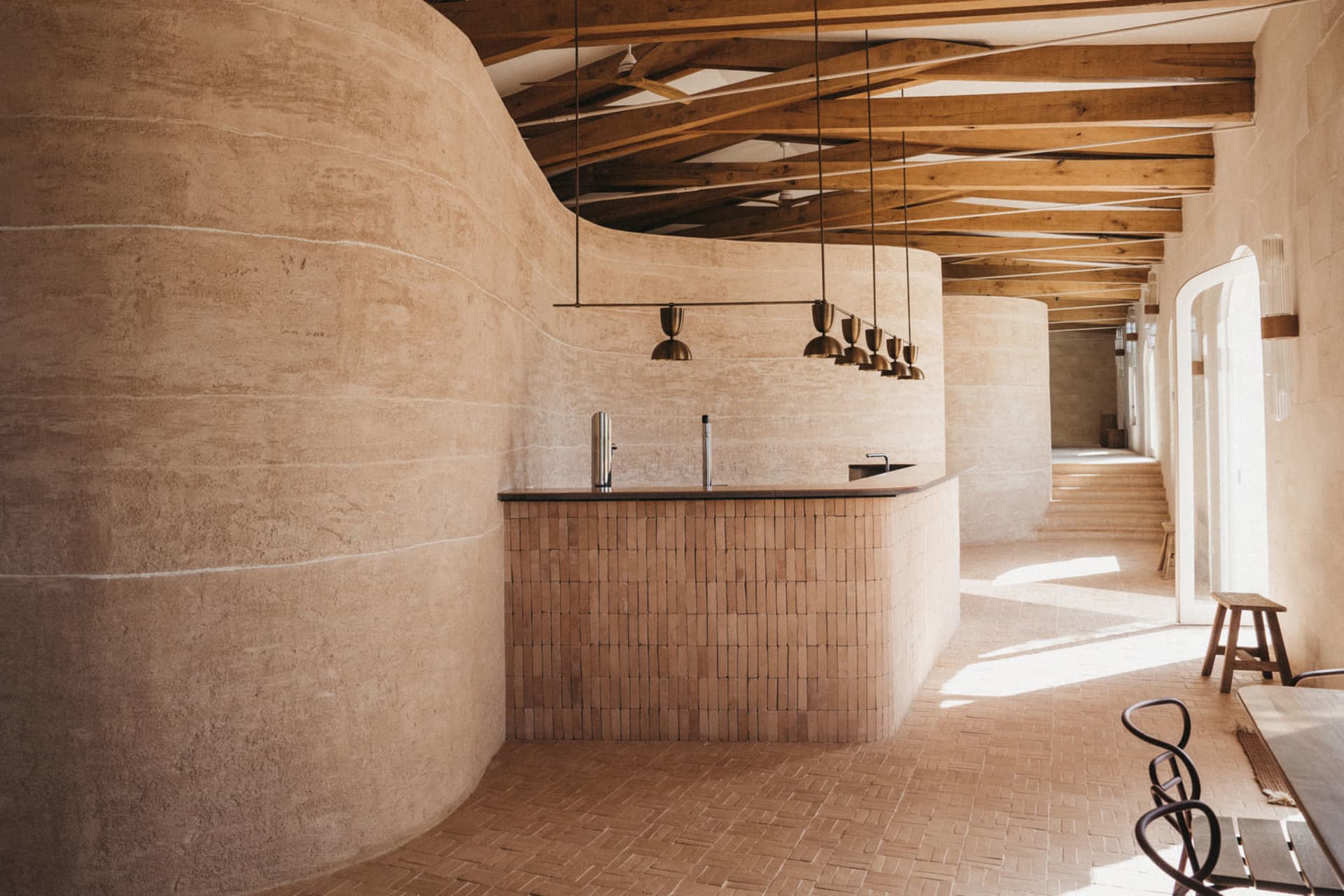 A modern commercial kitchen with a terrazzo countertop.