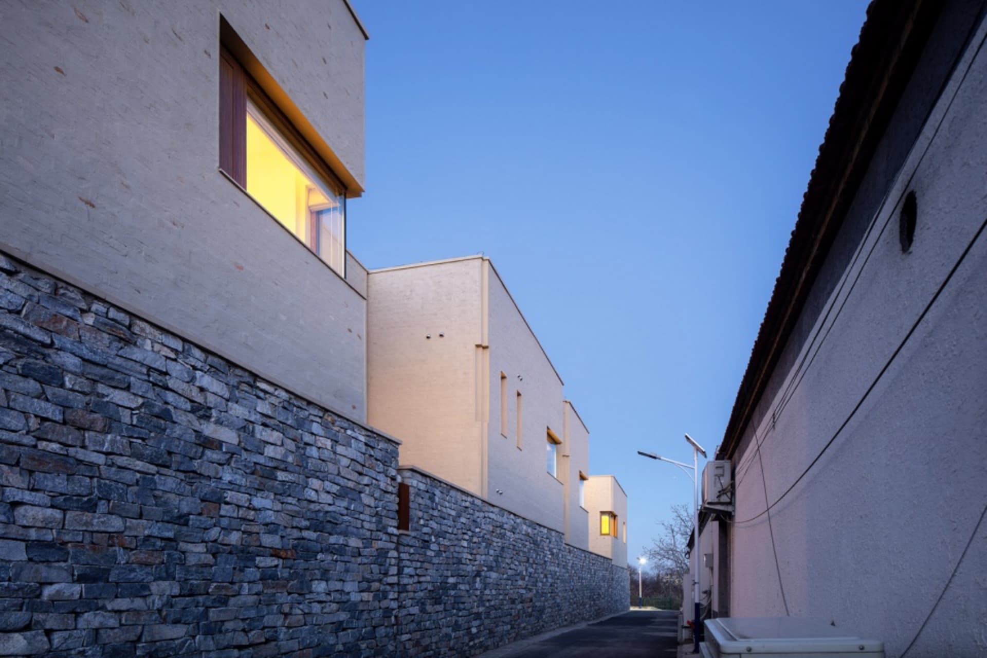 Modern residential building with brick exterior in urban setting