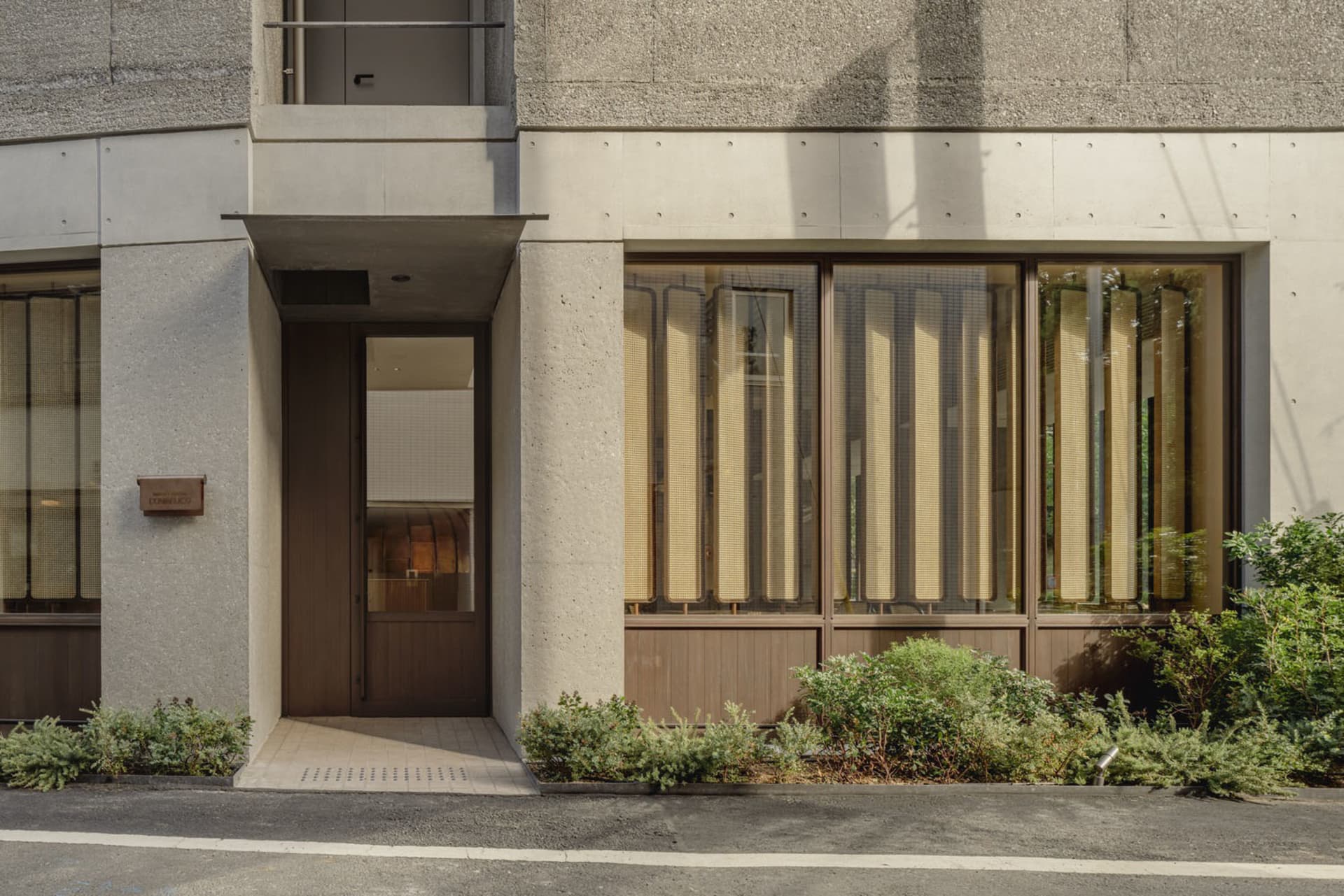 A modern retail storefront with a glass exterior.