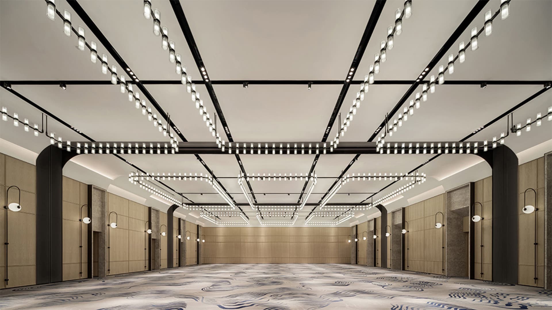 A spacious, modern conference room with minimalist design and contemporary lighting features.