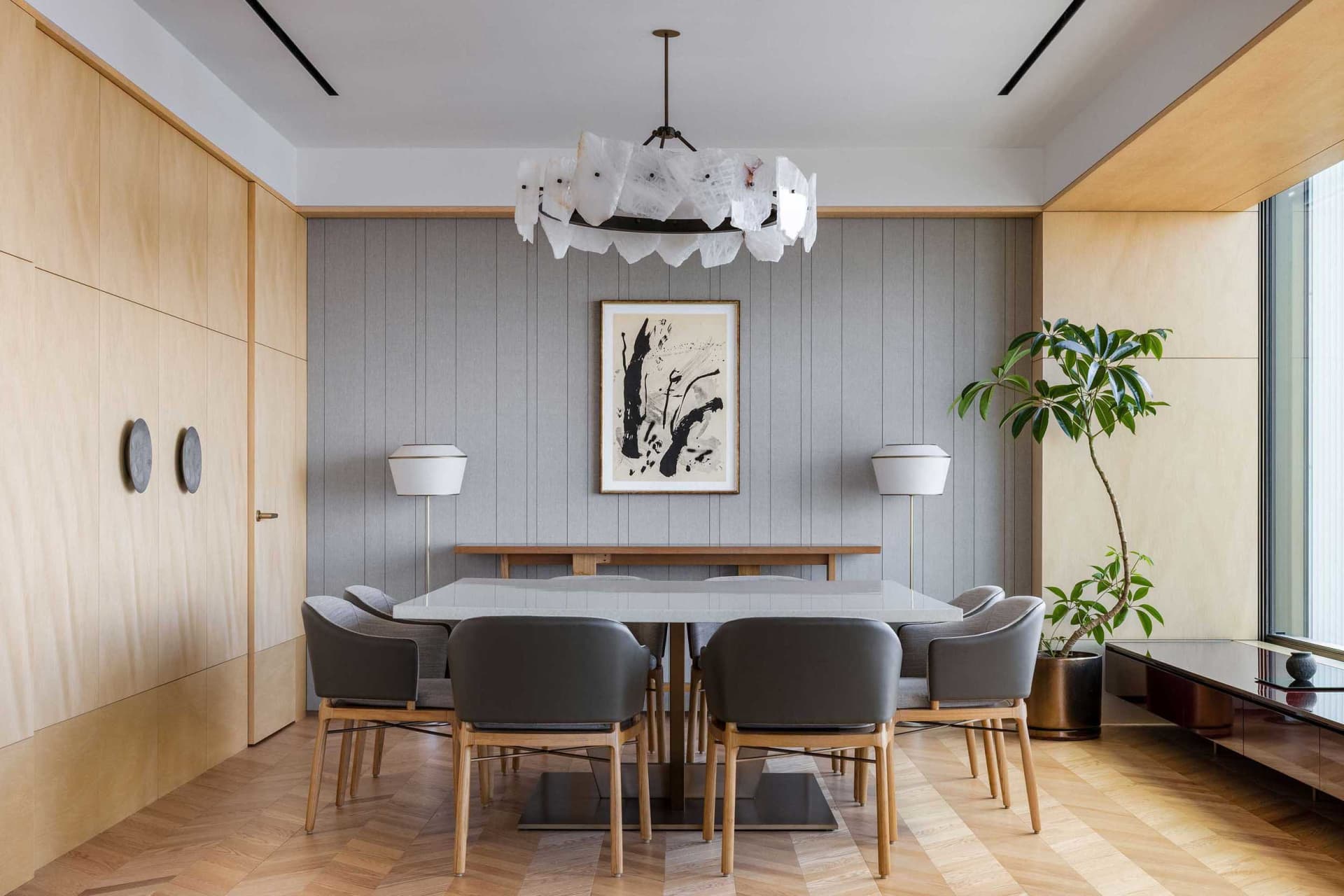 Modern dining room with wood and concrete materials