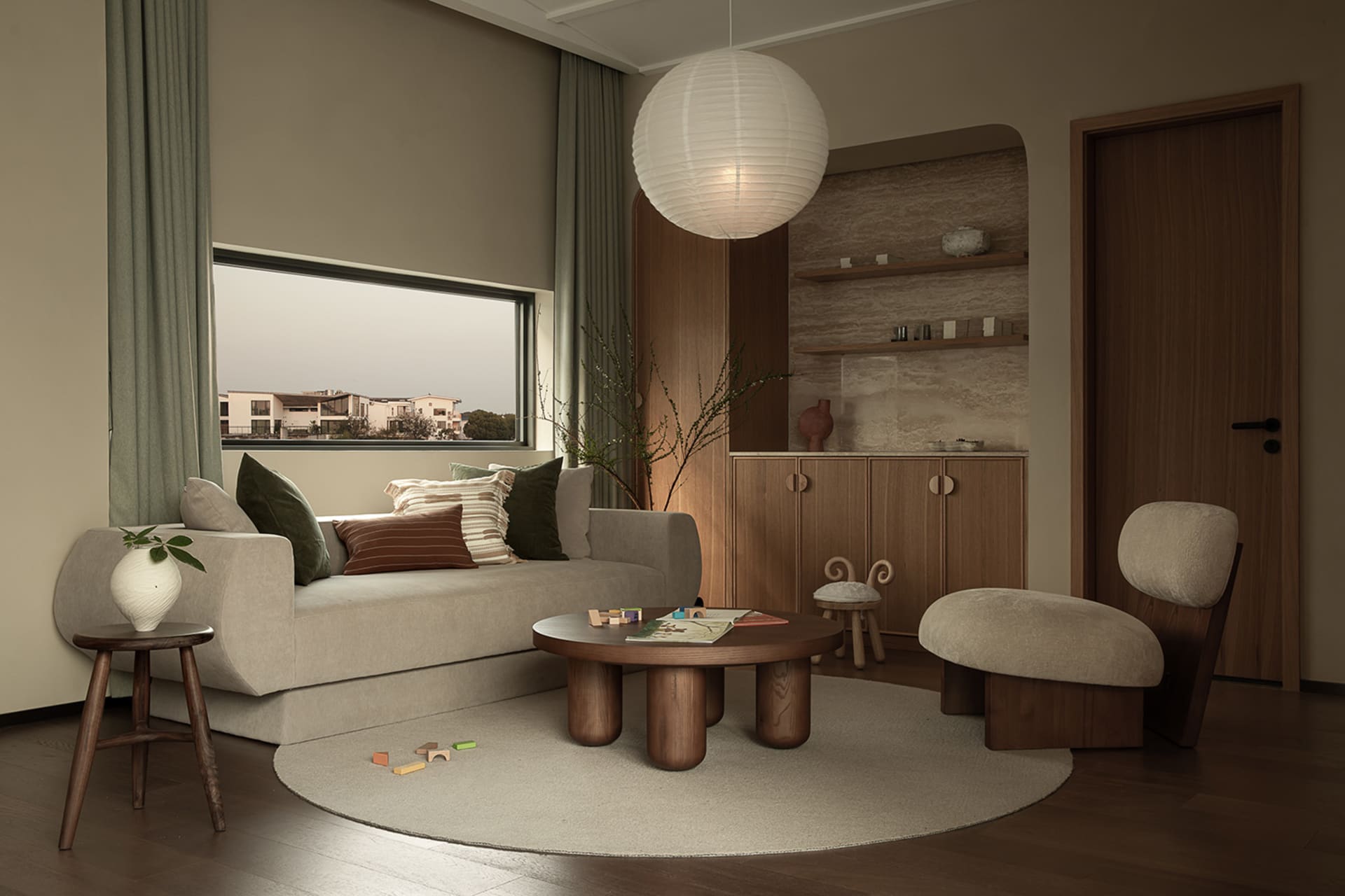 Modern living room featuring contemporary furniture and modern materials, with a large window offering natural light and a vi