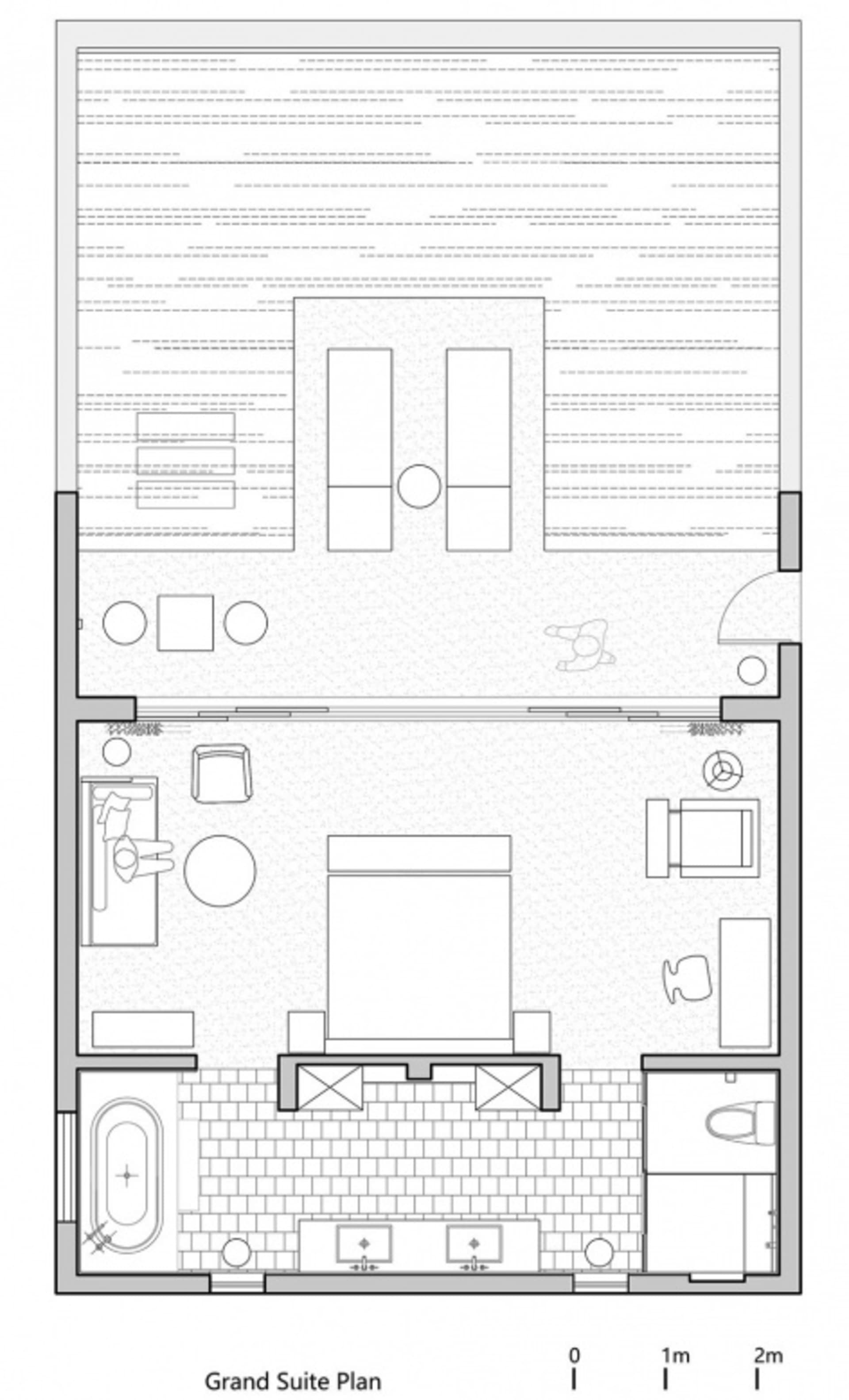 Grand suite layout plan depicting a bedroom and attached bathroom with furniture and fixtures indicated.