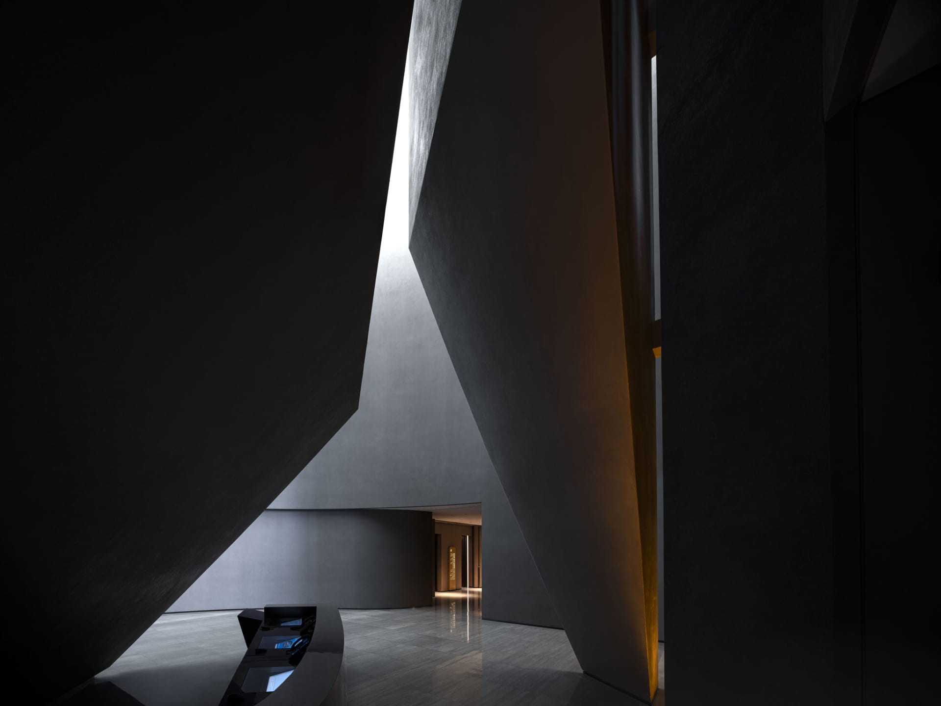 Modern lobby with metallic and concrete architectural features