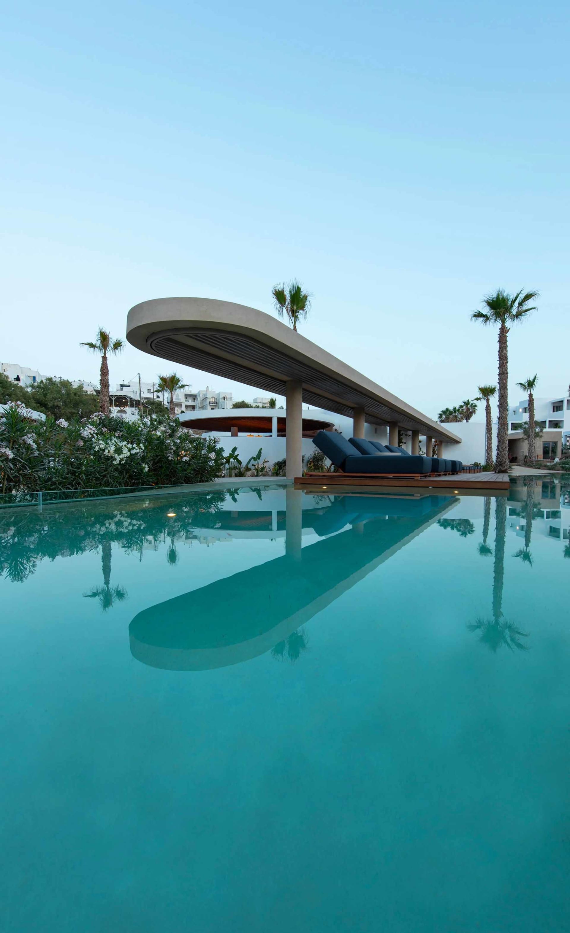Swimming pool with minimalist design and concrete structure.