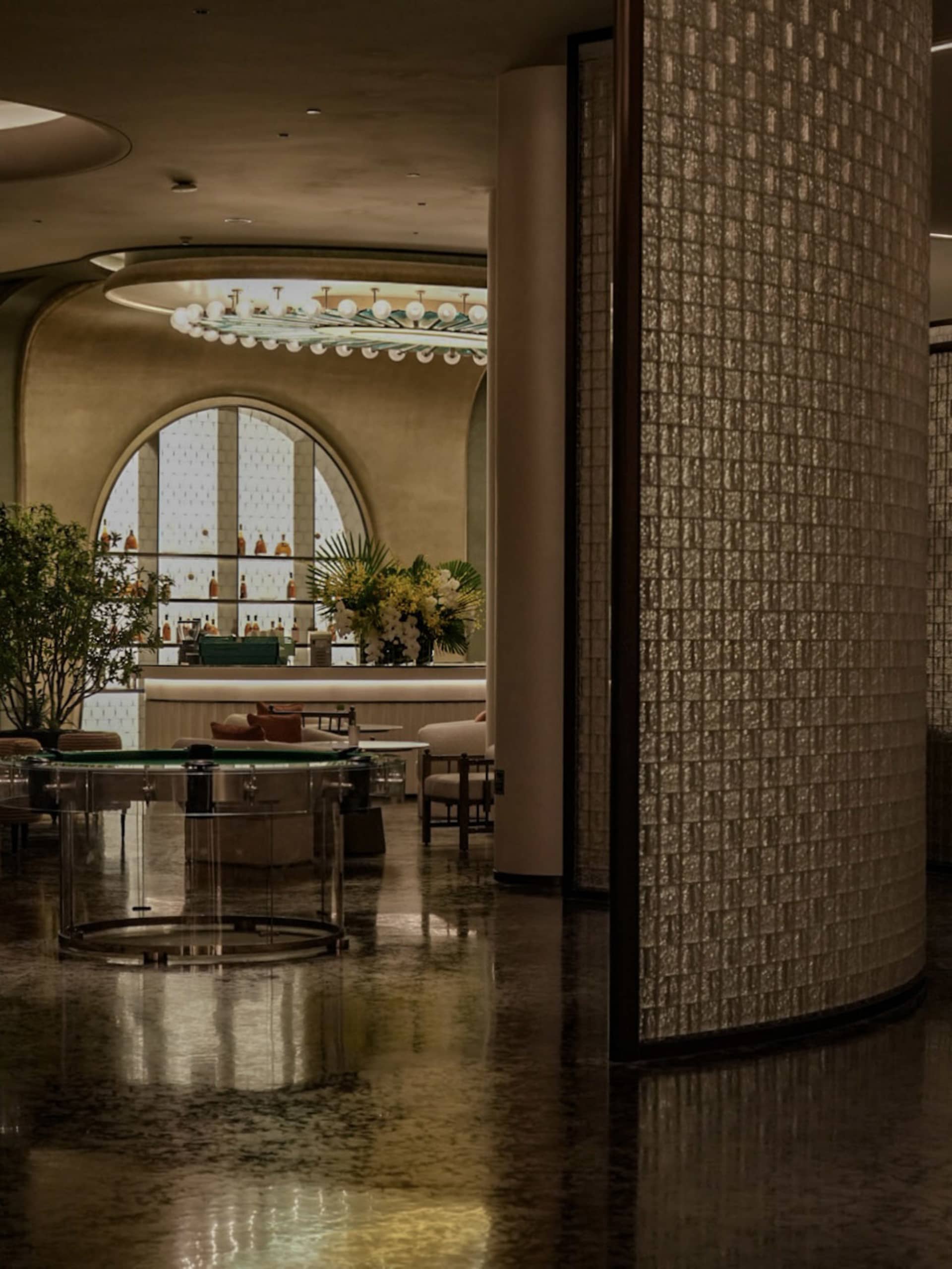 Modern restaurant interior featuring brick and clay tiles with mosaic patterns