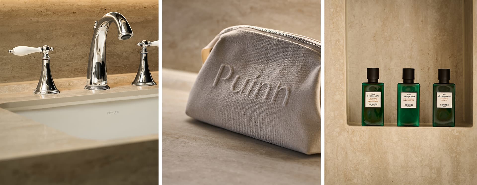 Close-up of a modern bathroom sink with metallic fixtures, a grey fabric pouch with the word 'Puuh', and green bottles of bat