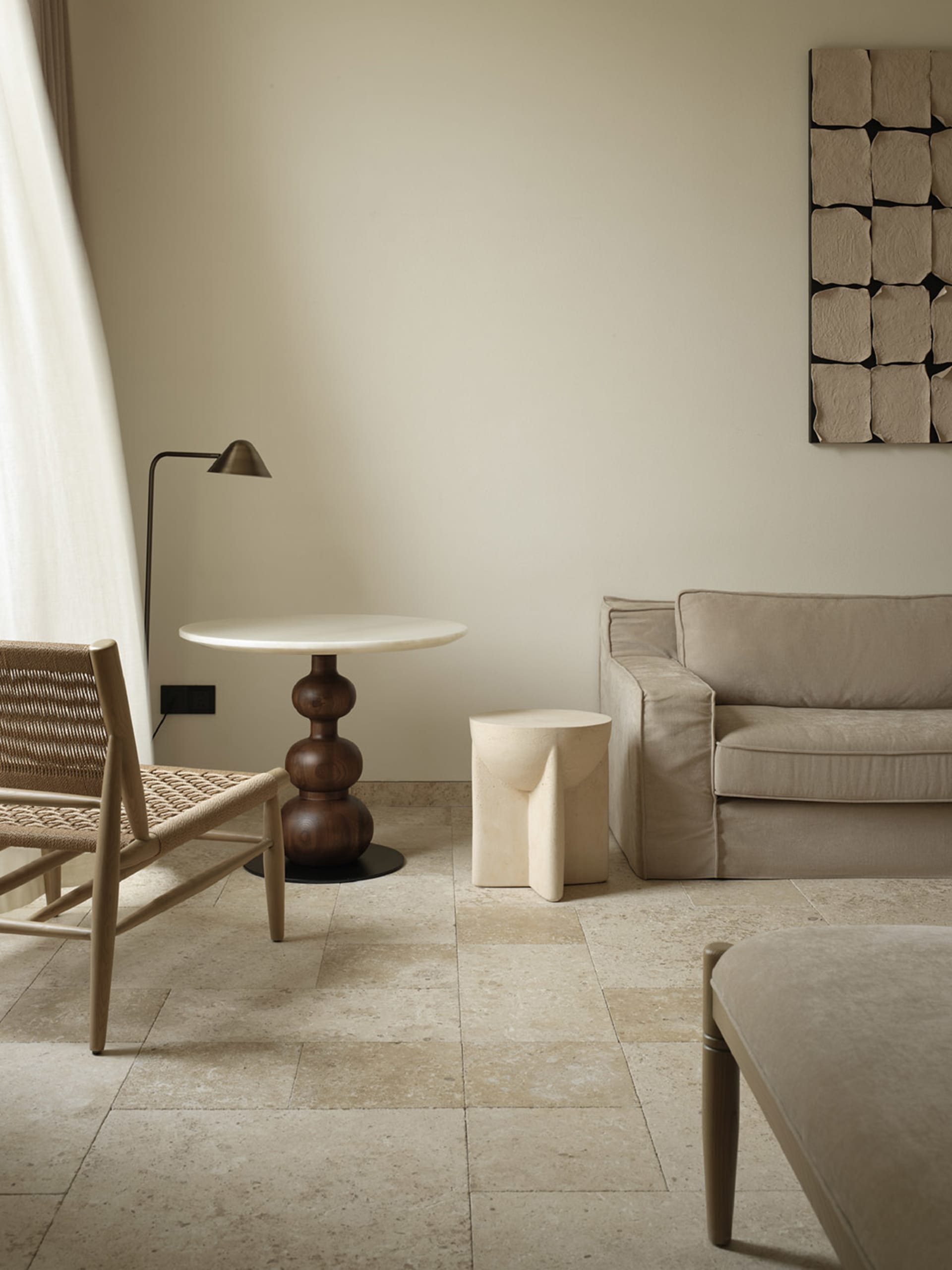 Minimalist residential interior with metallic accents and industrial design elements.