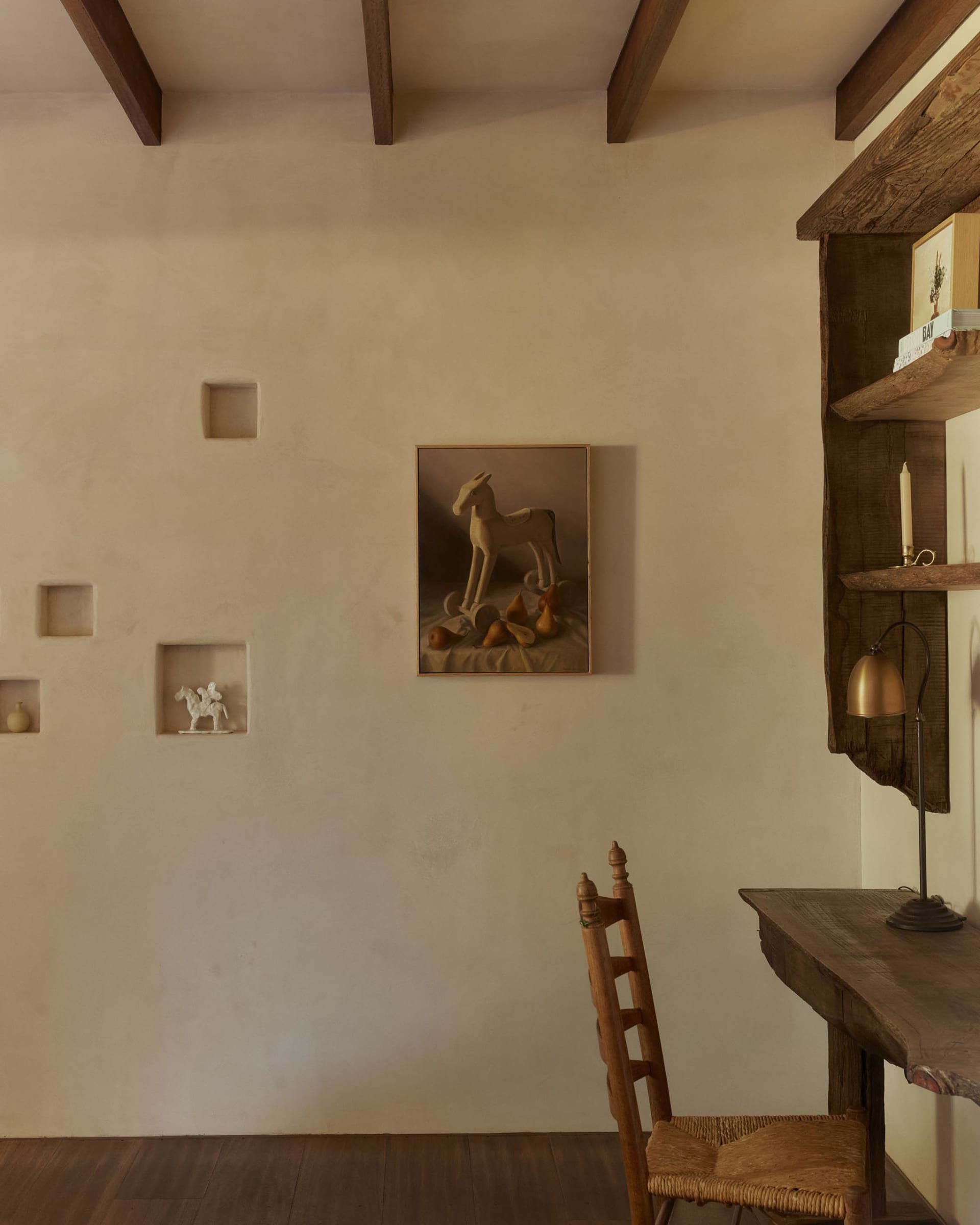 Retail storefront with wooden and plaster elements