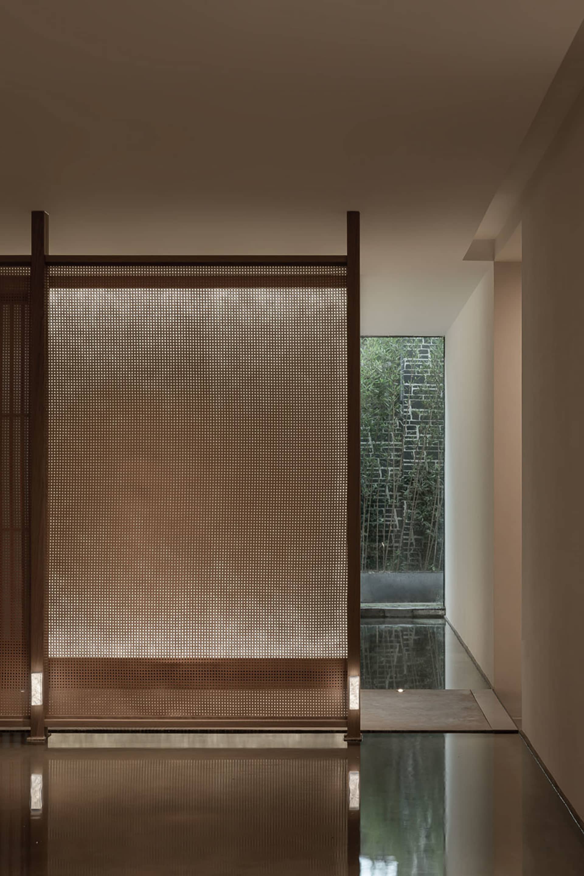 Interior view featuring a modern design with a metal perforated panel