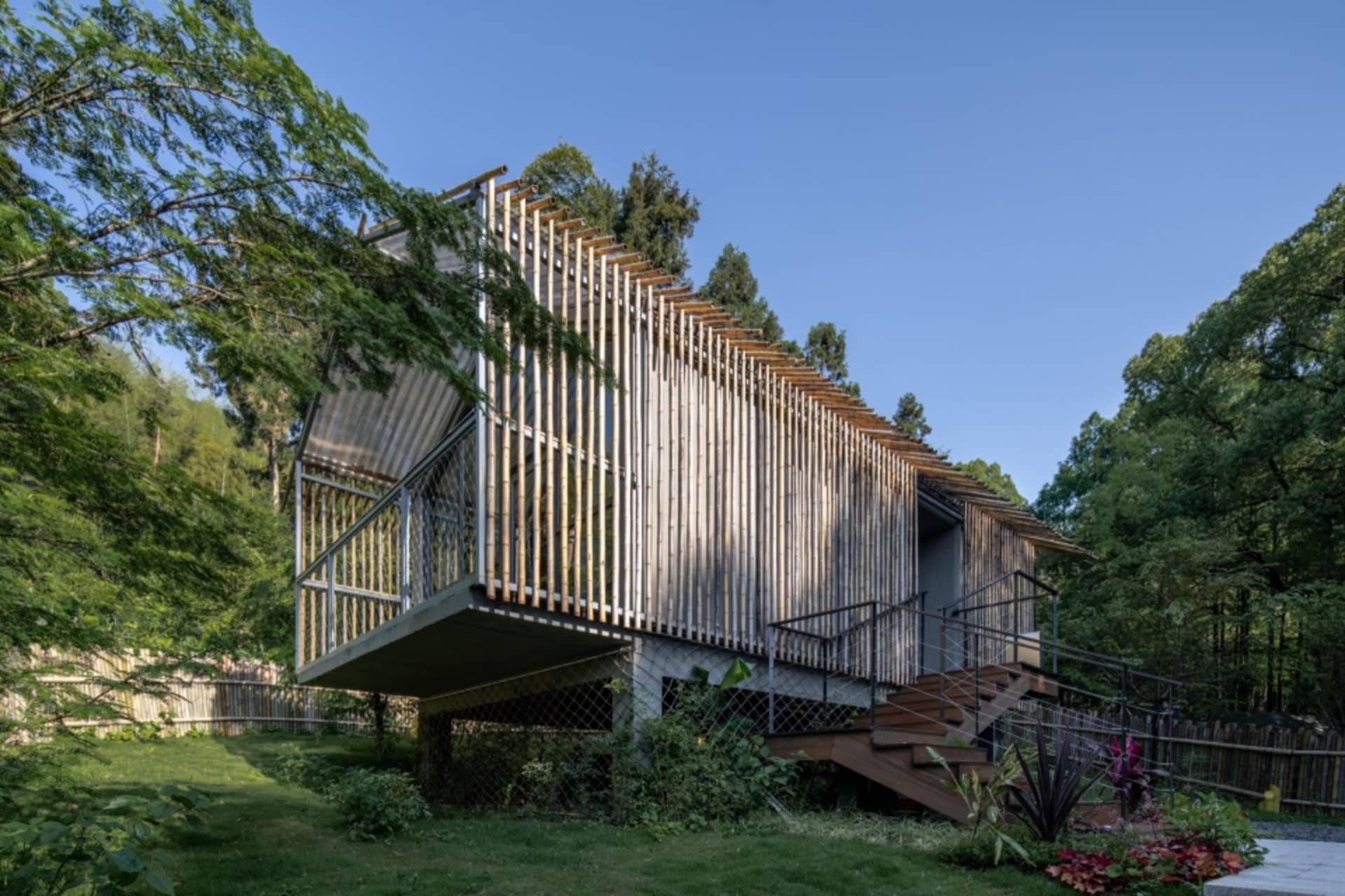 A modern wooden home with a unique design, featuring a wooden exterior and a blend of contemporary and natural elements.