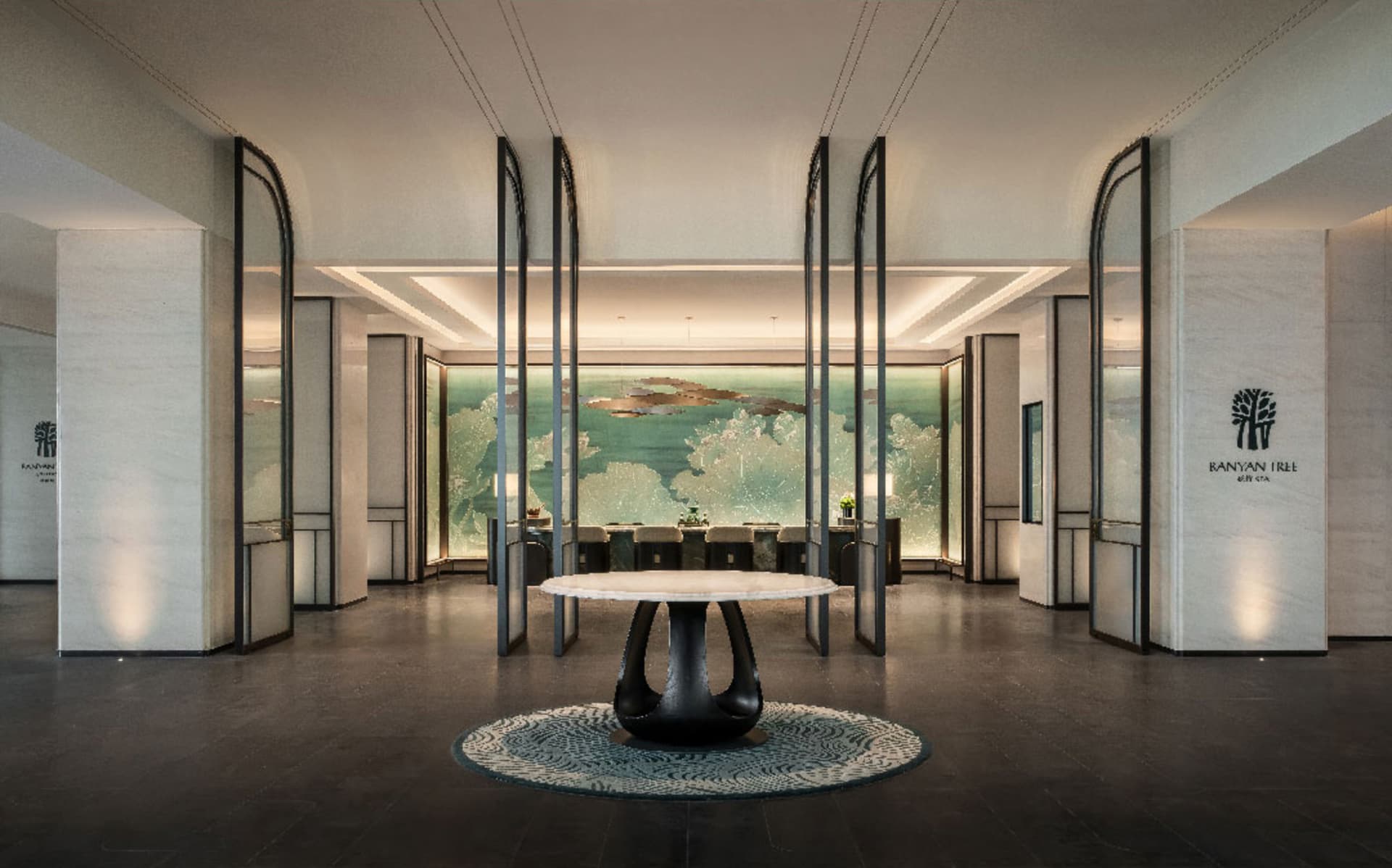 A modern hotel lobby featuring marble, glass, and metal materials