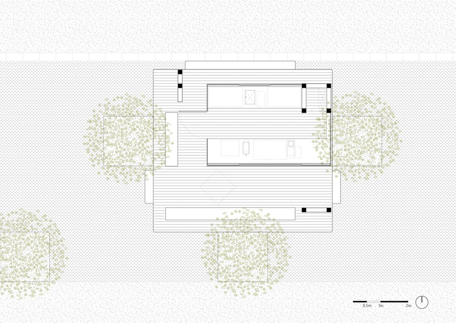 A detailed overhead view of a modern house patio with wooden flooring and surrounding greenery.