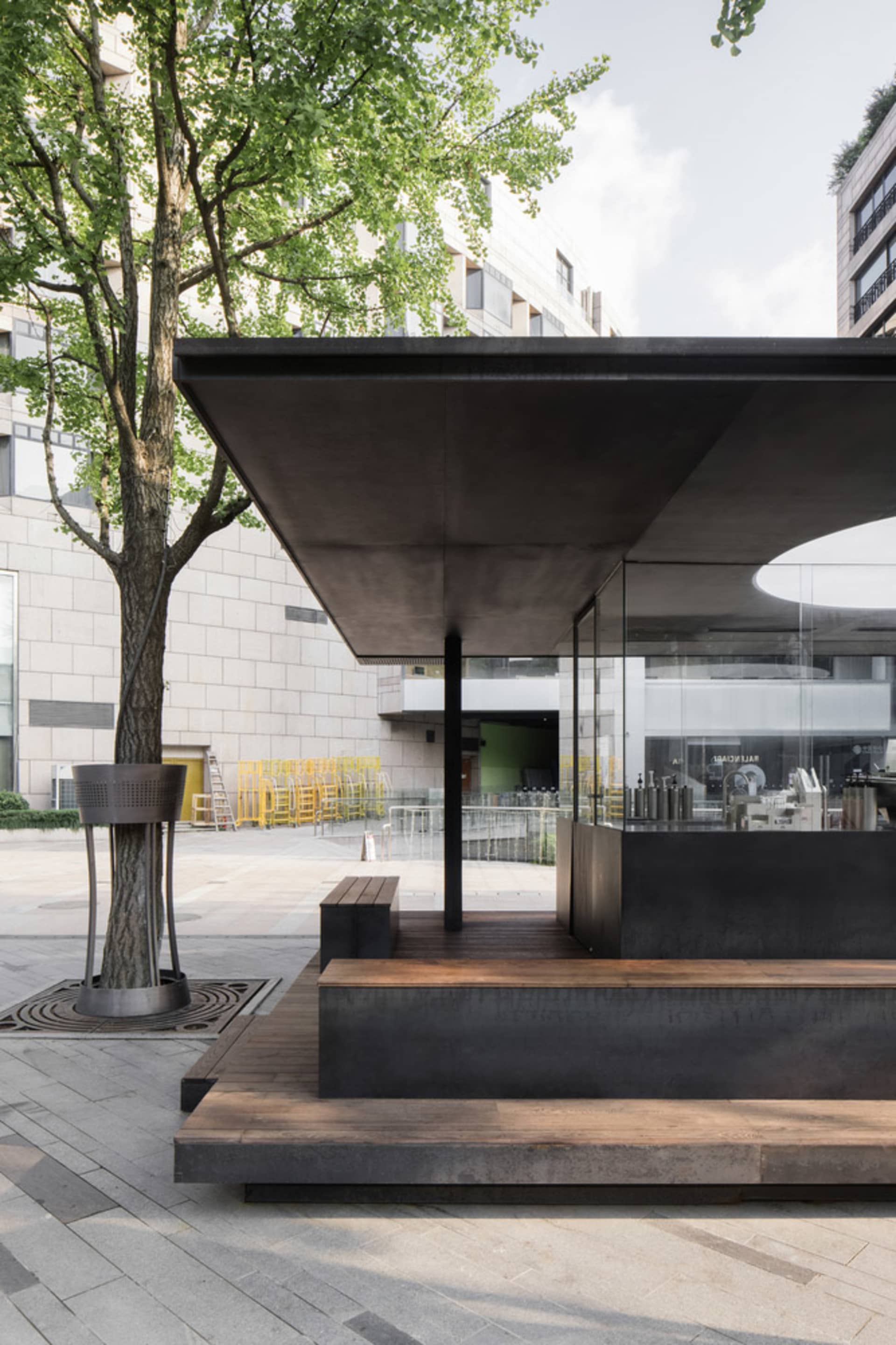 Modern restaurant exterior with steel and glass structure