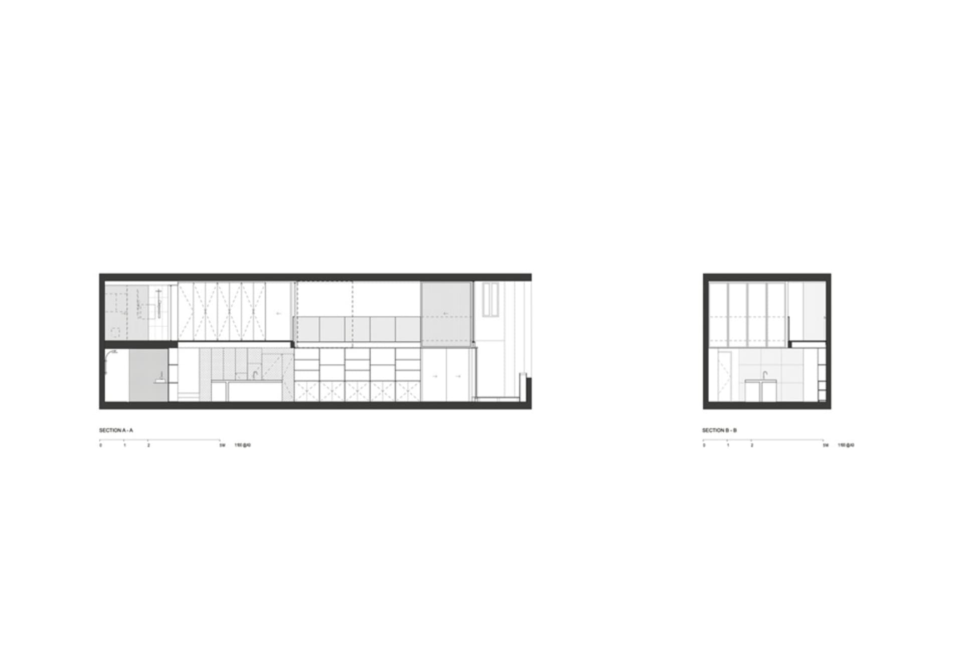 A minimalist kitchen layout featuring modern design principles, with clean lines and a cohesive color palette.