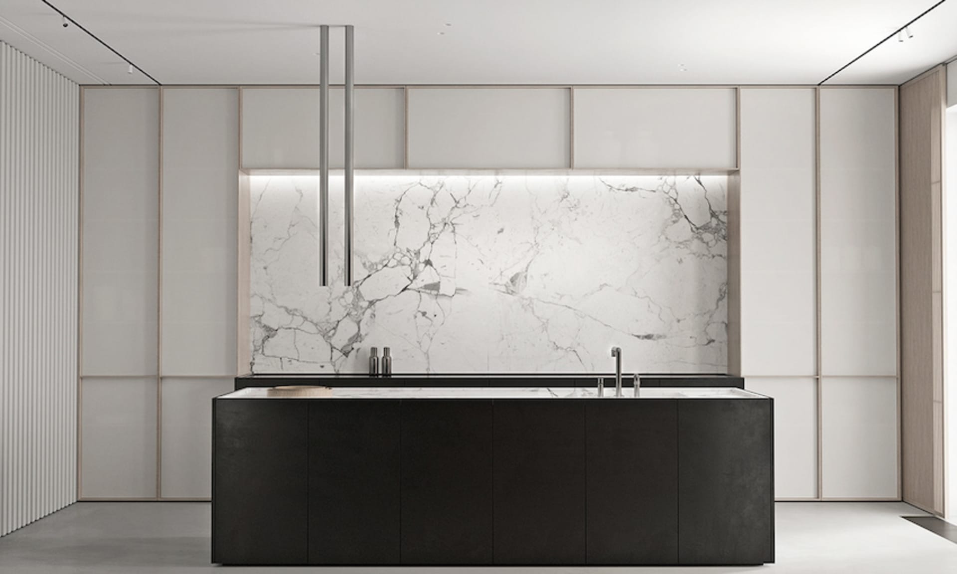 Modern minimalist kitchen with white marble backsplash and black cabinetry