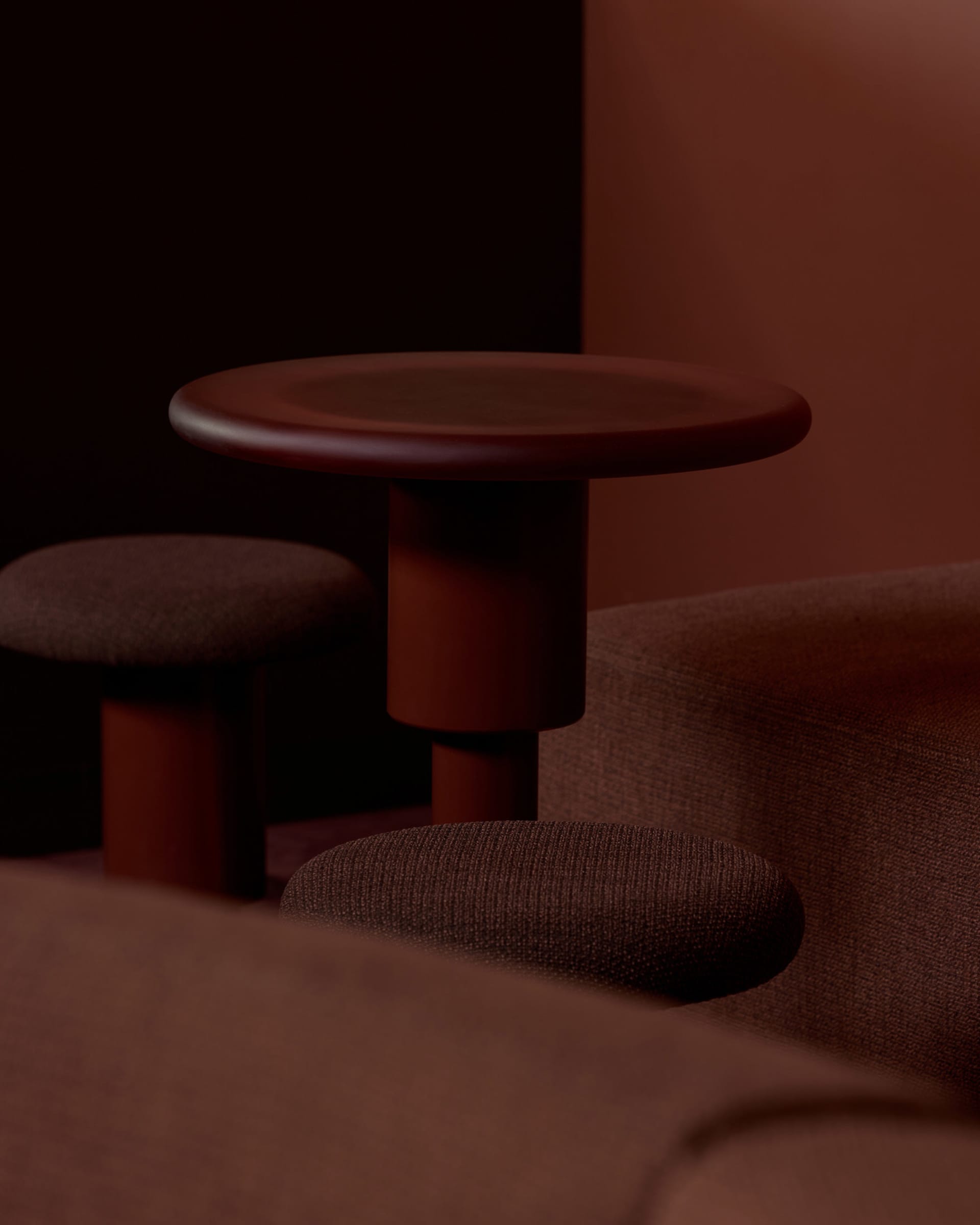 A brown leather chair sits in front of a wooden table in a cozy living area, designed for relaxation and socializing