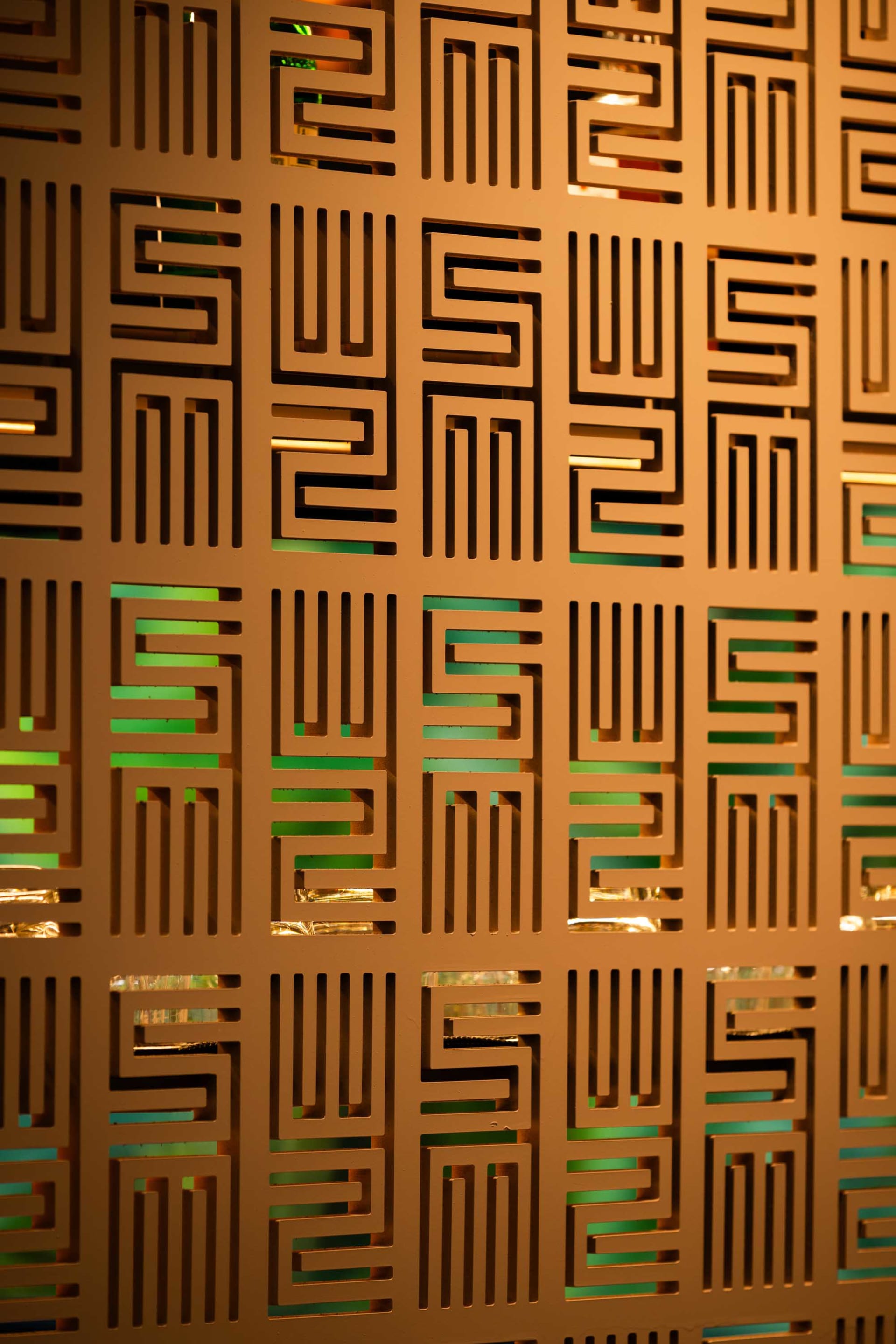 Abstract geometric design featuring a pattern of squares and rectangles in a modern space with wood and metal elements