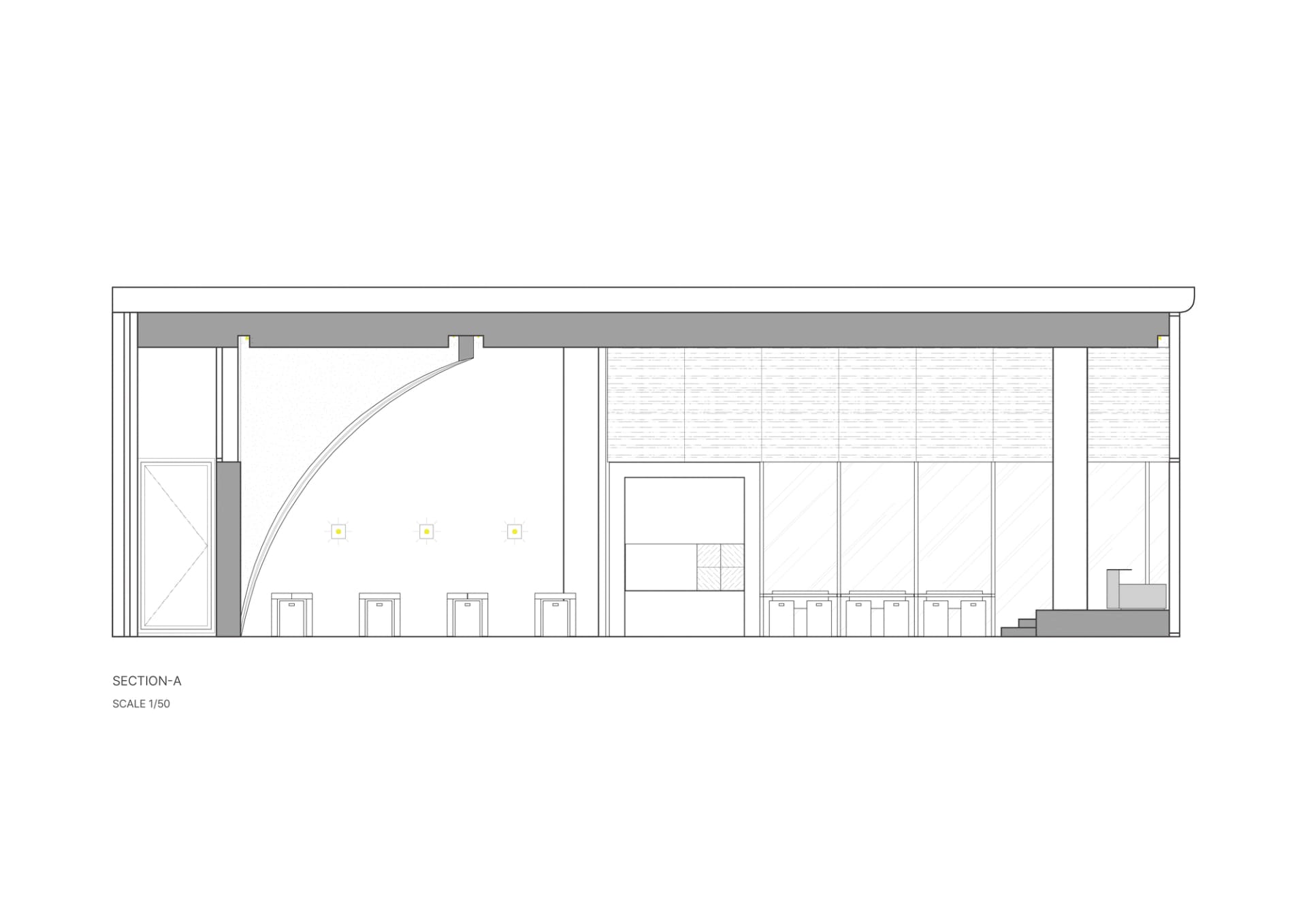 A modern commercial space with a large open area, dining area, kitchen, and chairs, suggesting a welcoming environment for visitors