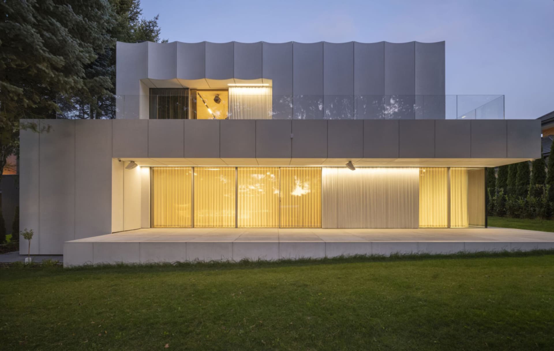 A modern building with a glass facade, clean lines, and ample natural light