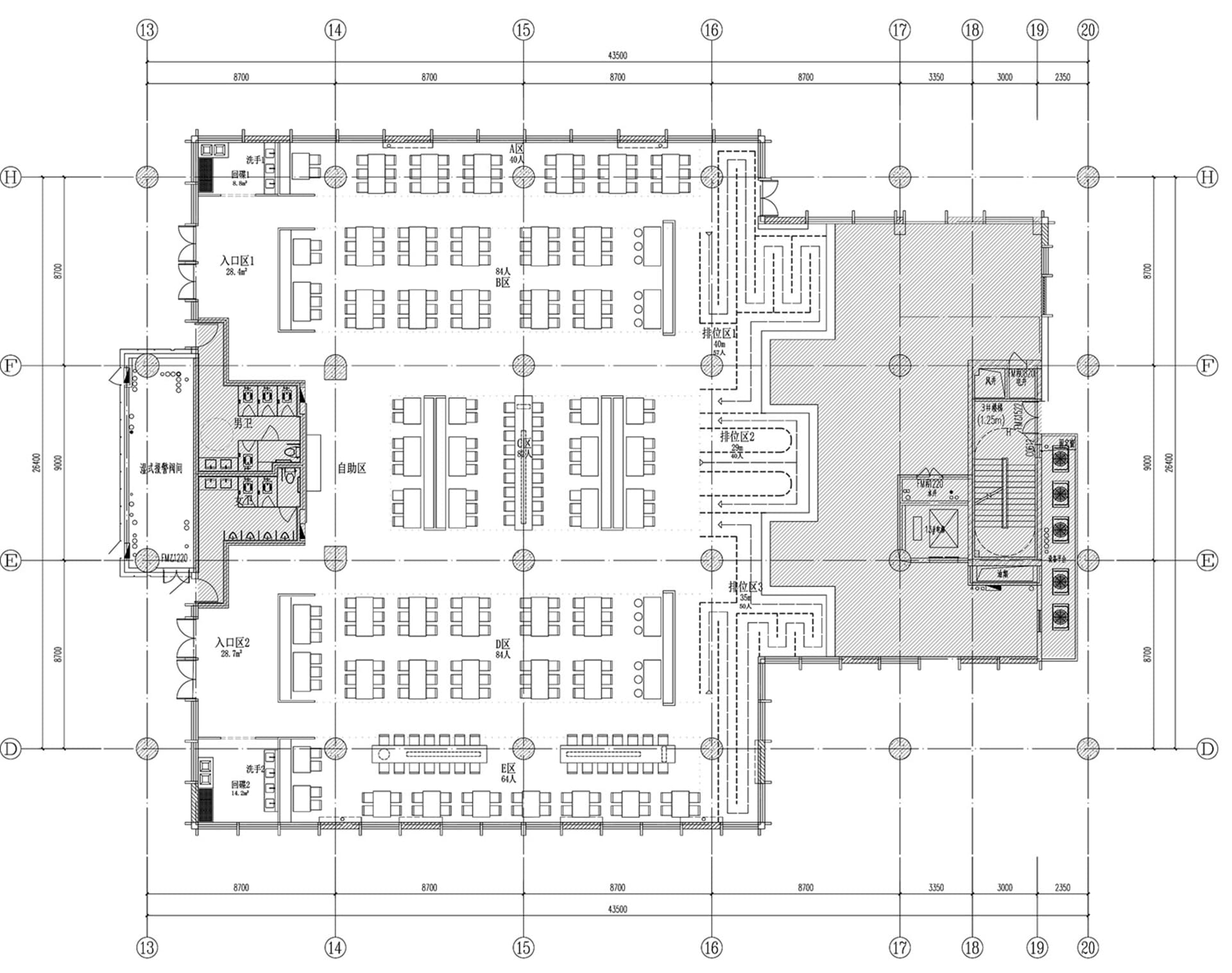 A large open space with multiple dining tables and chairs, creating a spacious and inviting environment for gatherings or events