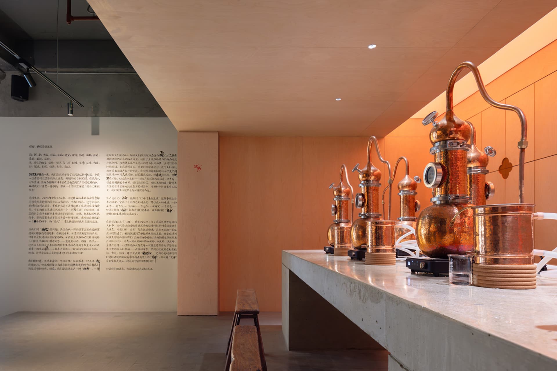 A modern bar or restaurant interior with metal storage units, exotic wall writings, and a stylish atmosphere