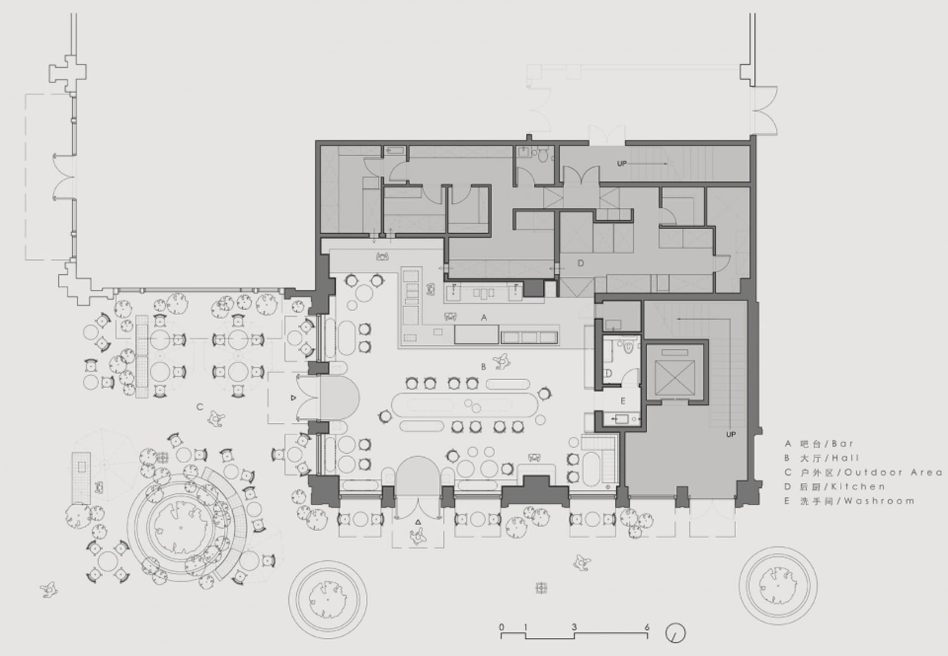 2D floor plan of a restaurant with modern and traditional design elements, well-lit with natural light through windows and skylights