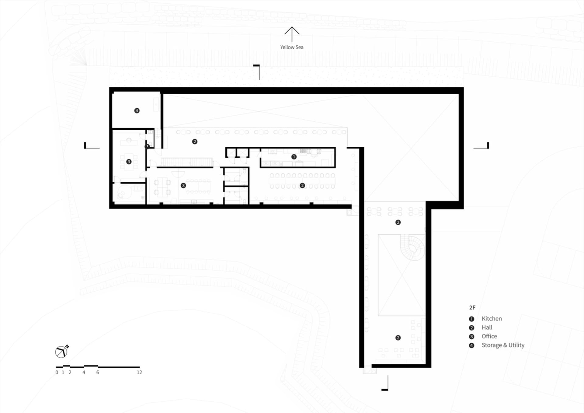 Architectural drawing of a multi-level building with various rooms and a kitchen area, featuring linework, labels, and measurements