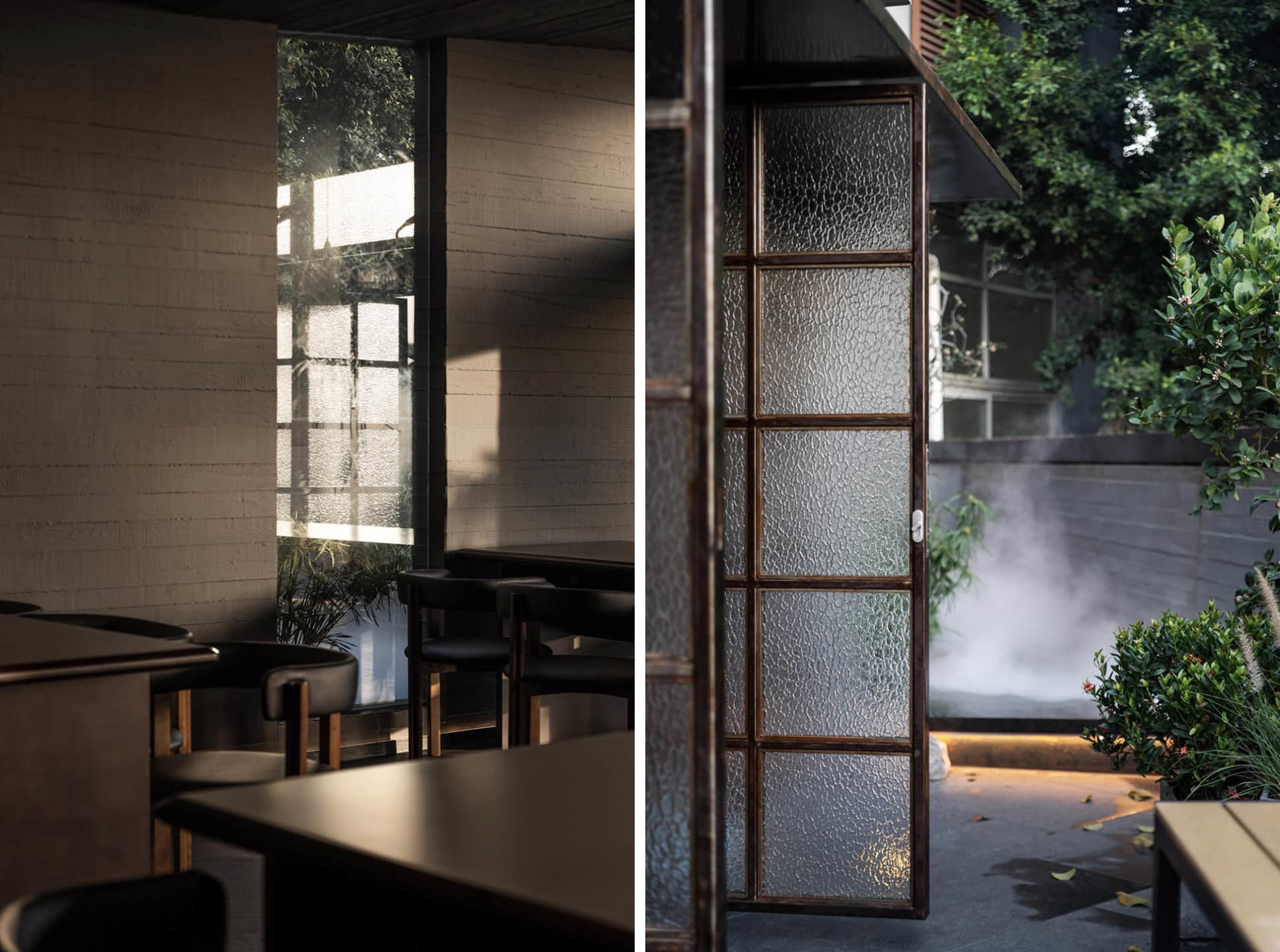 A dining area with wooden furniture and a modern glass doorway, creating a warm and inviting atmosphere