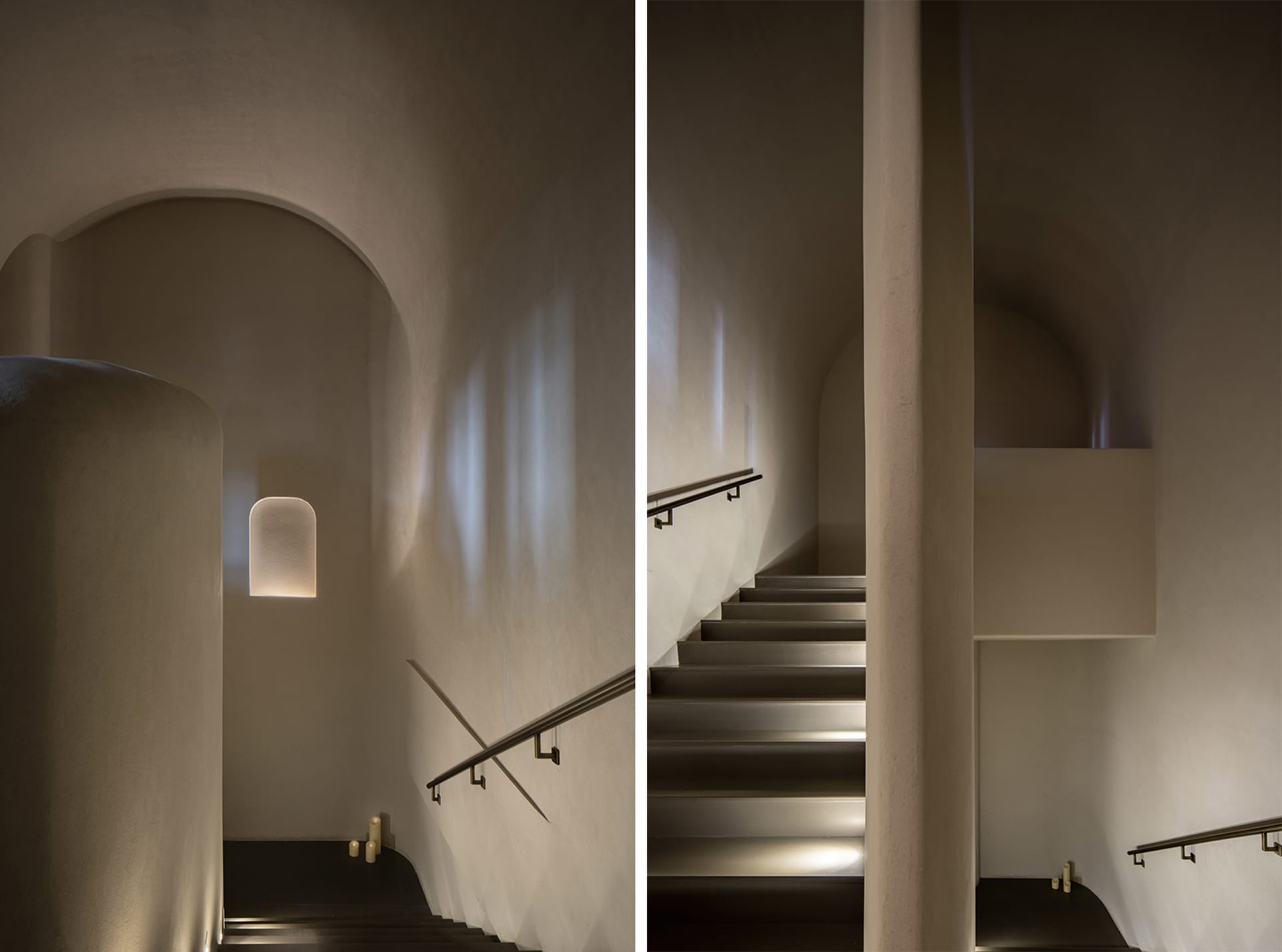 A stone wall with a black and white photo of a staircase on one side and a rendered architectural scene of the same staircase on the other, featuring a metal railing