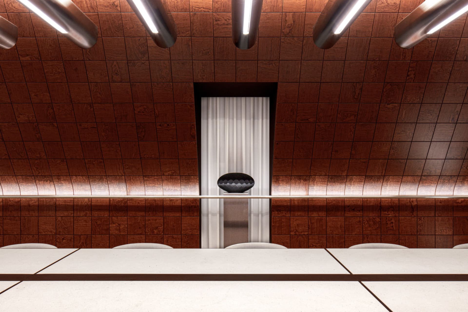 A warm and inviting hallway with wooden walls and floors, featuring two doors and a cozy atmosphere created by the use of wood and soft lighting