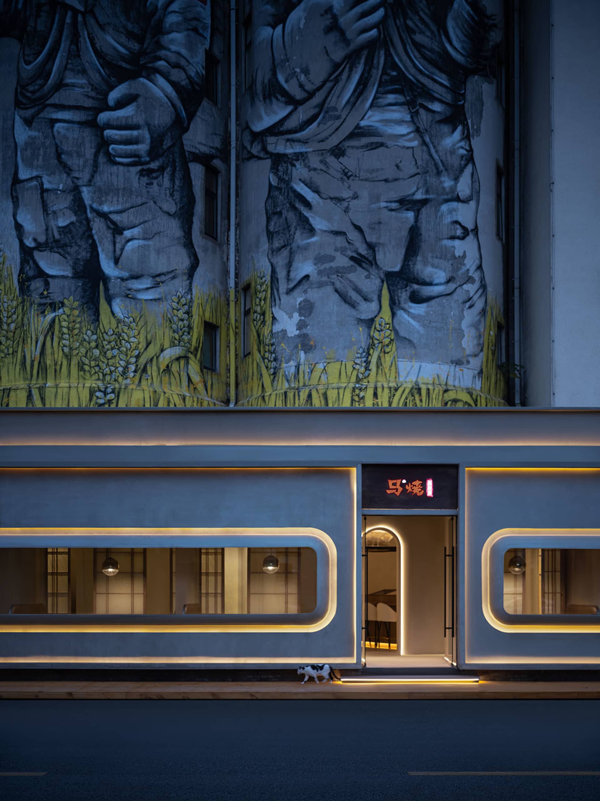 A creative representation of a building's interior with a large painting on the wall featuring chairs, dining tables, and a dog, showcasing the artist's interpretation of the space