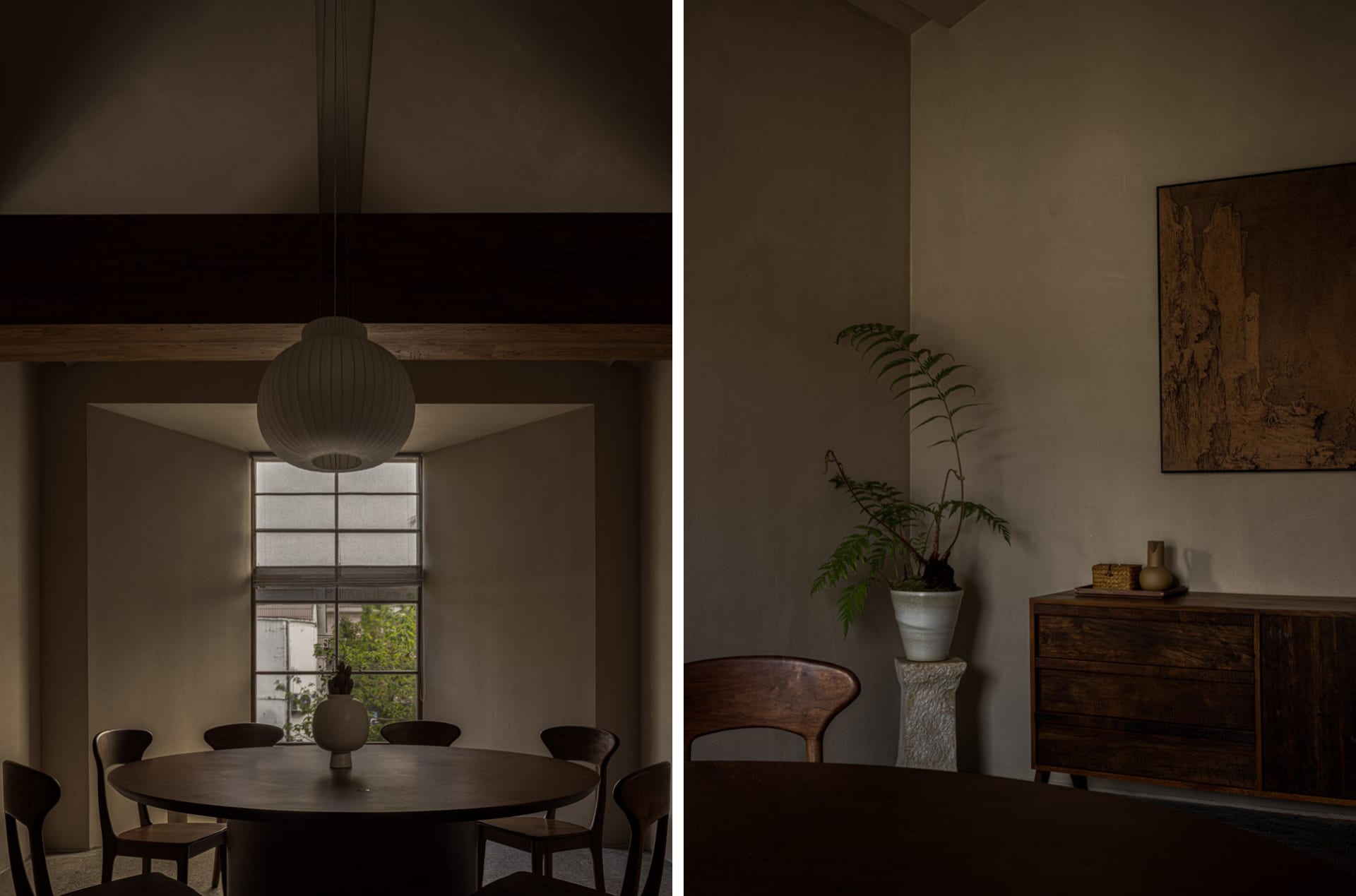 Dimly lit dining space with chairs, a dining table, and a potted plant near a window