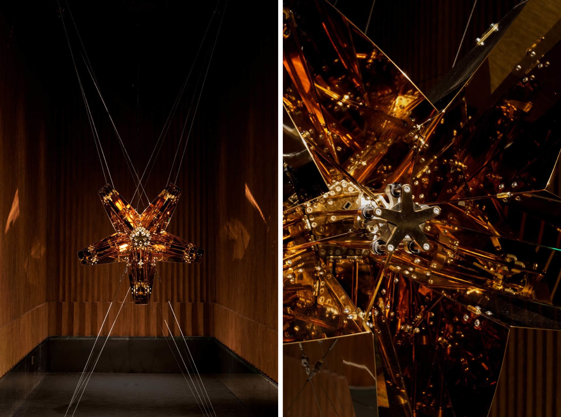 A modern lobby with office chairs and a large glass sculpture hanging from the ceiling, creating a unique and well-designed space