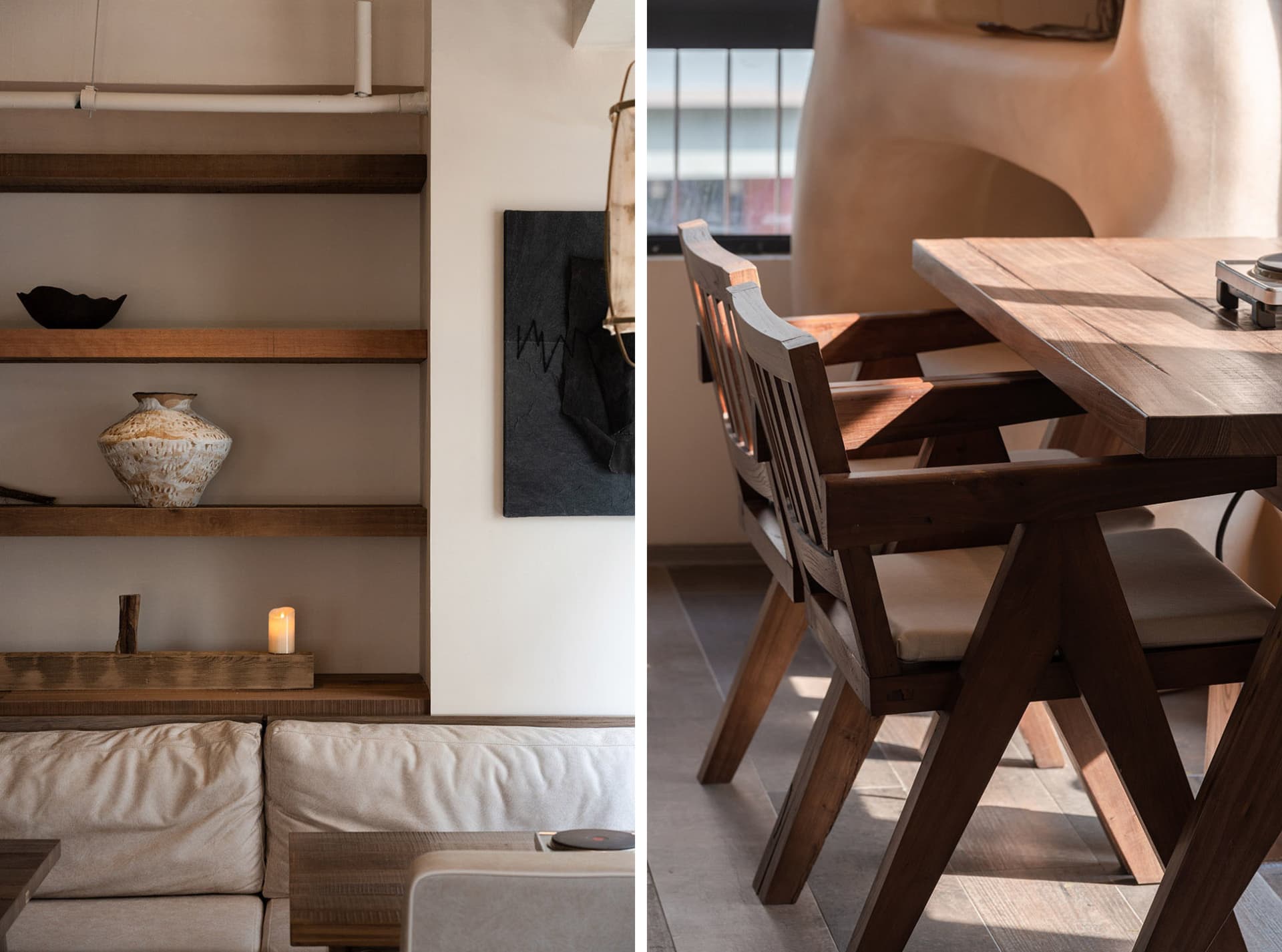 Comfortable living space with a couch, chair, dining table, and books, well-lit and inviting