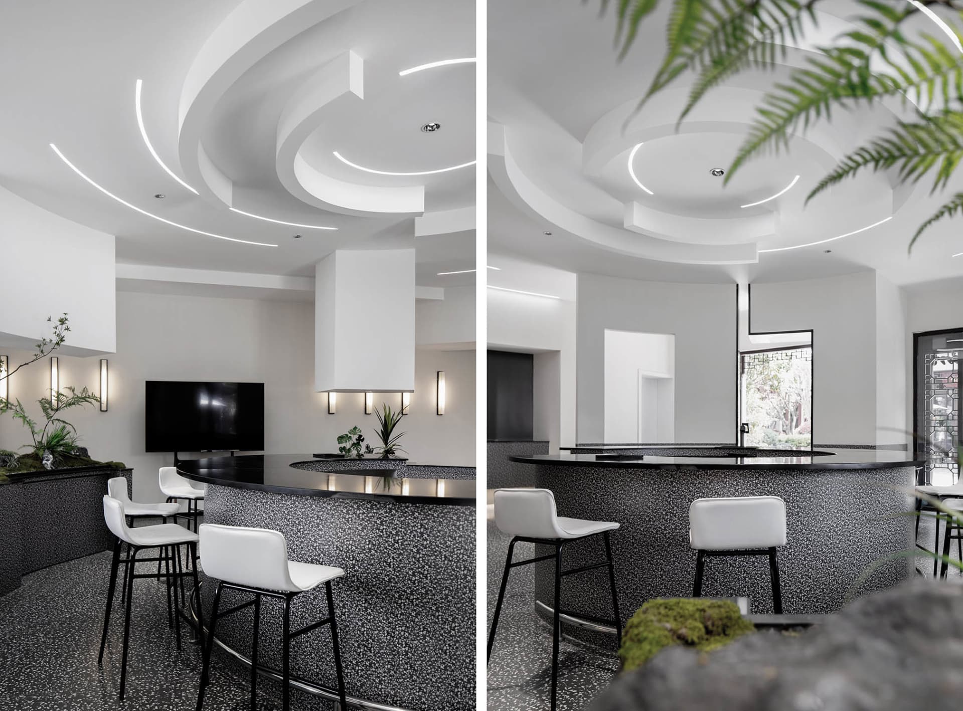 Modern restaurant interior with chairs and tables, marble countertops, and glass surfaces, well-lit for a welcoming atmosphere