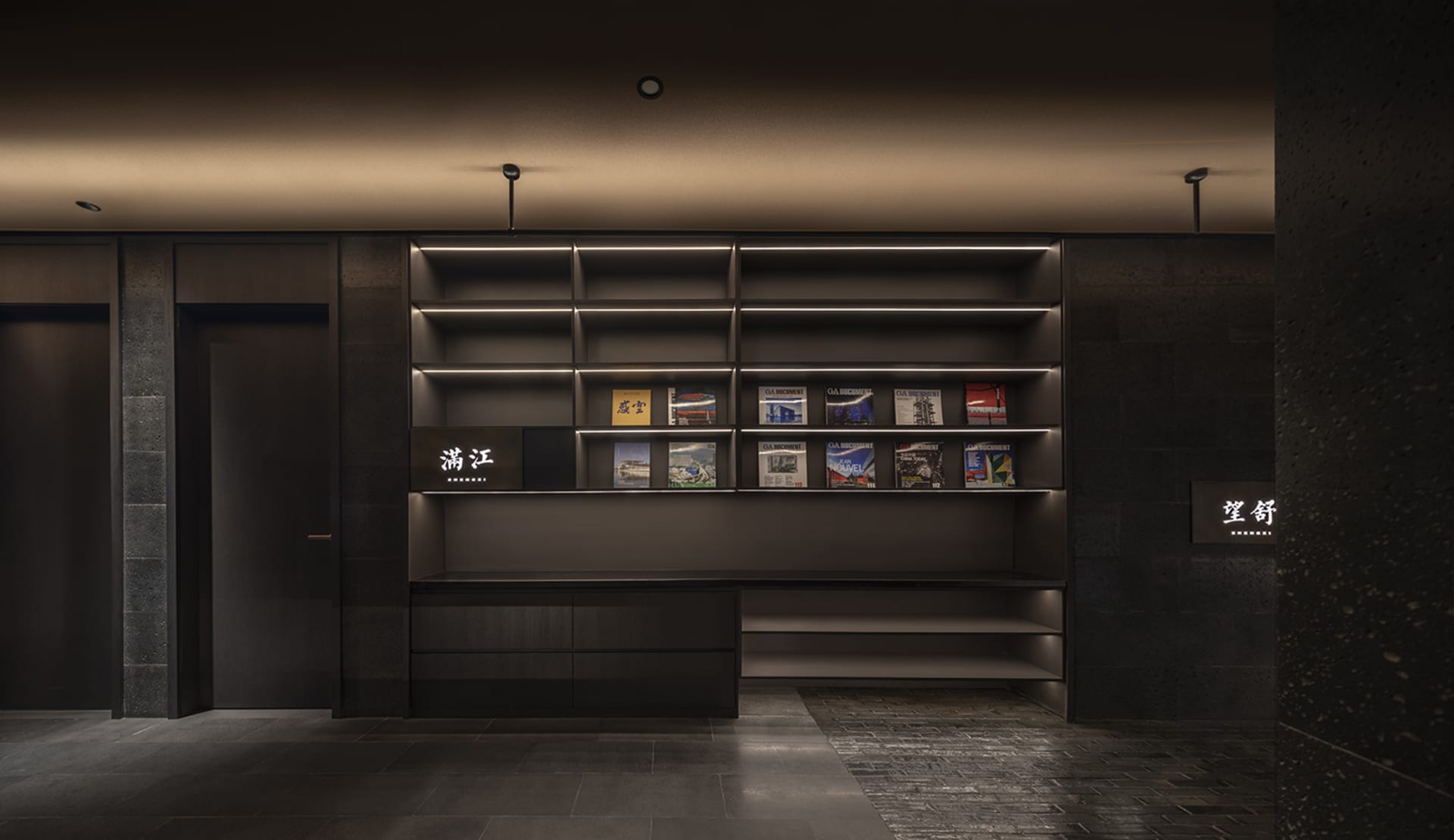 A dimly lit library or store with numerous books arranged on wooden shelves in various sizes and heights, creating a cozy atmosphere