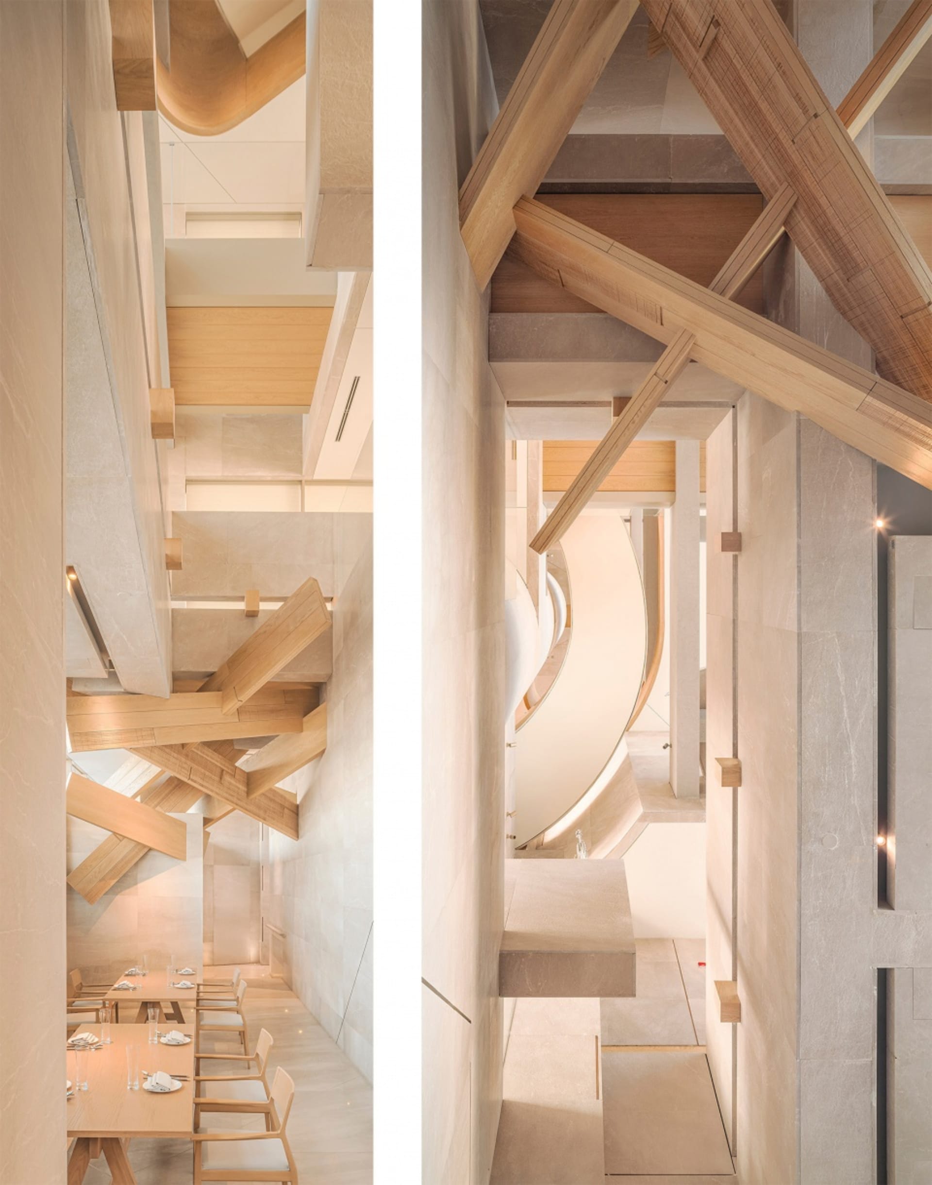 Spacious open concept living area with a large staircase, spiral staircase, chairs, and dining tables, set in a modern building with a focus on functionality and design