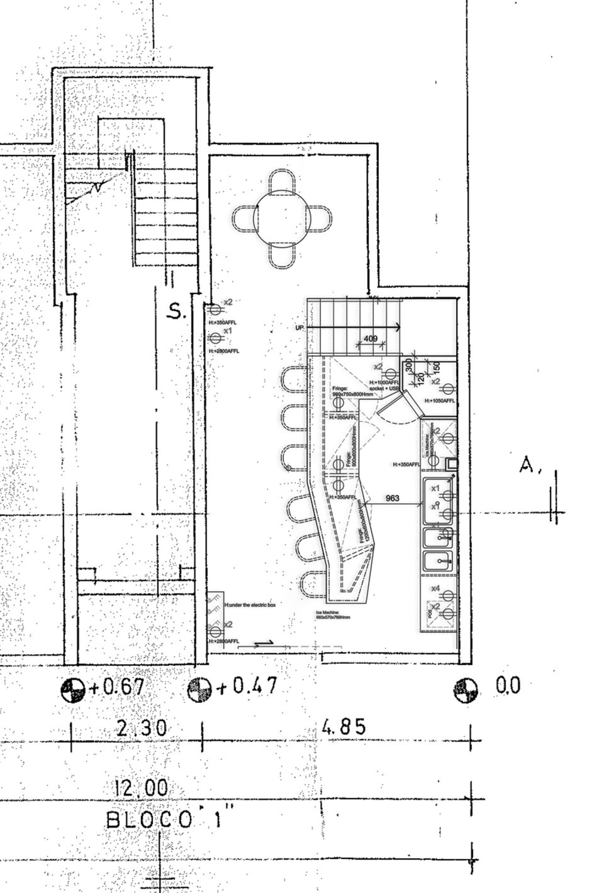 A small bathroom floor plan with a sink and toilet, featuring linework and labels