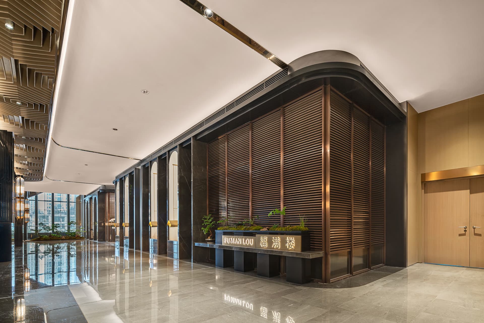 A well-designed lobby with a large wooden doorway, glass window, black table, potted plants, and a vase, set against a neutral background