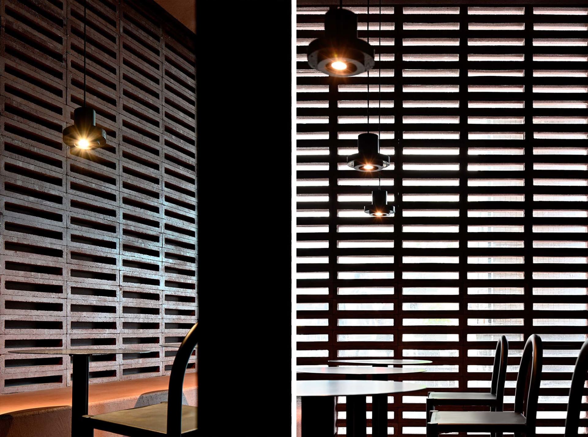 Dining area with a wooden table surrounded by metal chairs in a cozy and inviting space